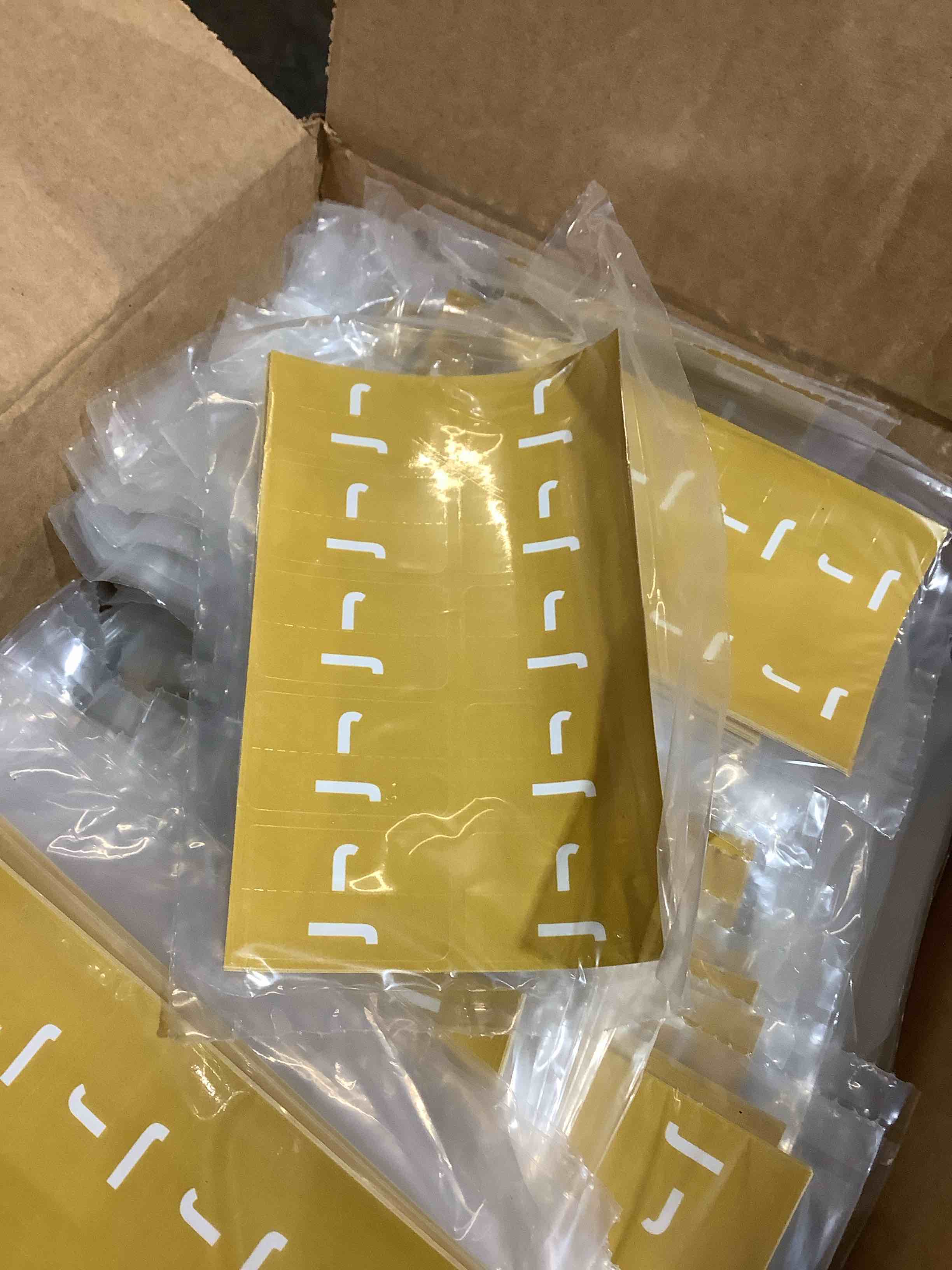 BOX FULL OF J STICKERS, MUSTARD COLOR