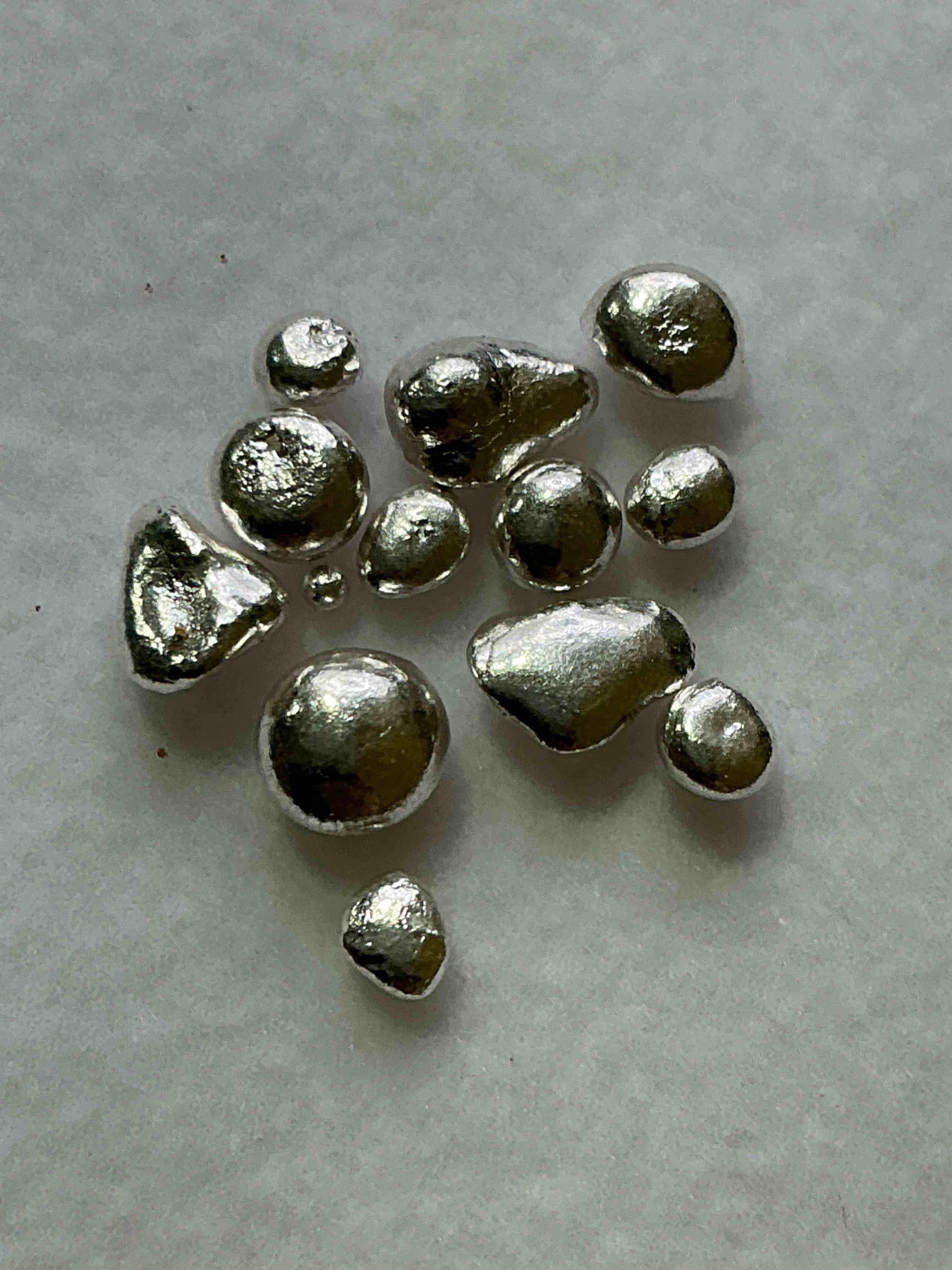 Silver Nuggets! .999 US Fine Silver, In Small Nugget Form! Total Weight Of All Nuggets In Lot Approximately 3 Grams, Bid Is Per Nugget! A Cool Way To Invest In Fine US Silver! Includes Collector Capsule!