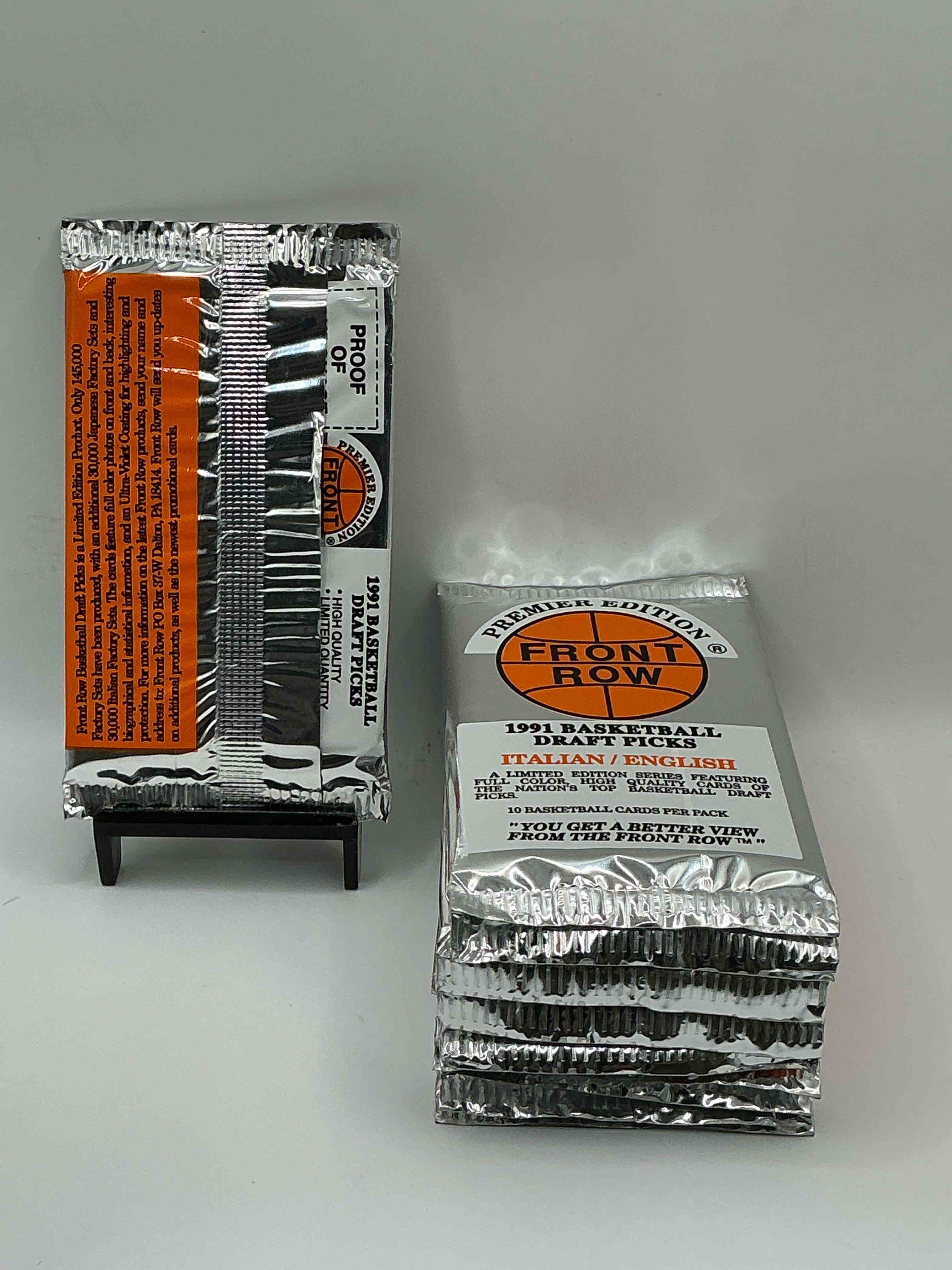 Condition photo showing New/Like New for 1991 Throwback Rarity! Here's Something You've Probably NEVER Seen! 1991 Front Row College Basketball / NBA Unopened Sealed Packs, Direct From Sealed Original Retail Case! Includes Randomly Inserted Rare Autograph Cards! Front Row Was The “Original" College Jersey Card Packs Back In The Day & Has Long Been Defunct. These Cards Are Becoming Serious Collector Items Due To Their Scarcity. These Things Are Serious Rare! Own Some Great Sports Card History & Something You'll Rarely See Again!