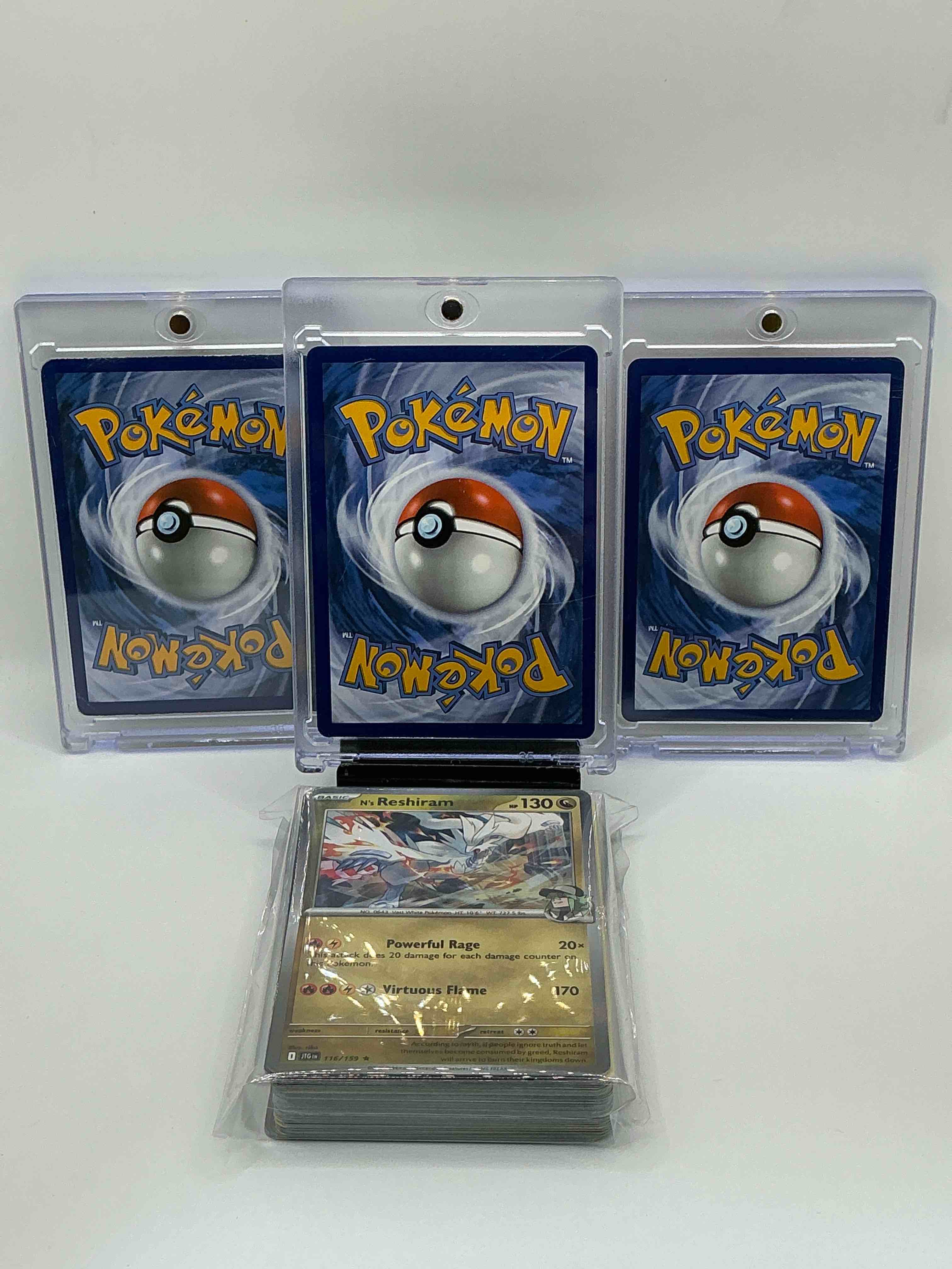 Condition photo showing New/Like New for Pokémon Palooza! Silver Kaleidoscope Holographic Infernal Reign Burning Darkness Charizard EX, Orange & Blue Fire Holographic Flame Screen Evil Incineration Team Rocket’s Moltres EX,  Silver & Yellow Lightning Thunder Shock Mega Thunderbolt Pikachu EX! Along With 50 Other Pokémon Holos, Heroes, Legends & Commons!