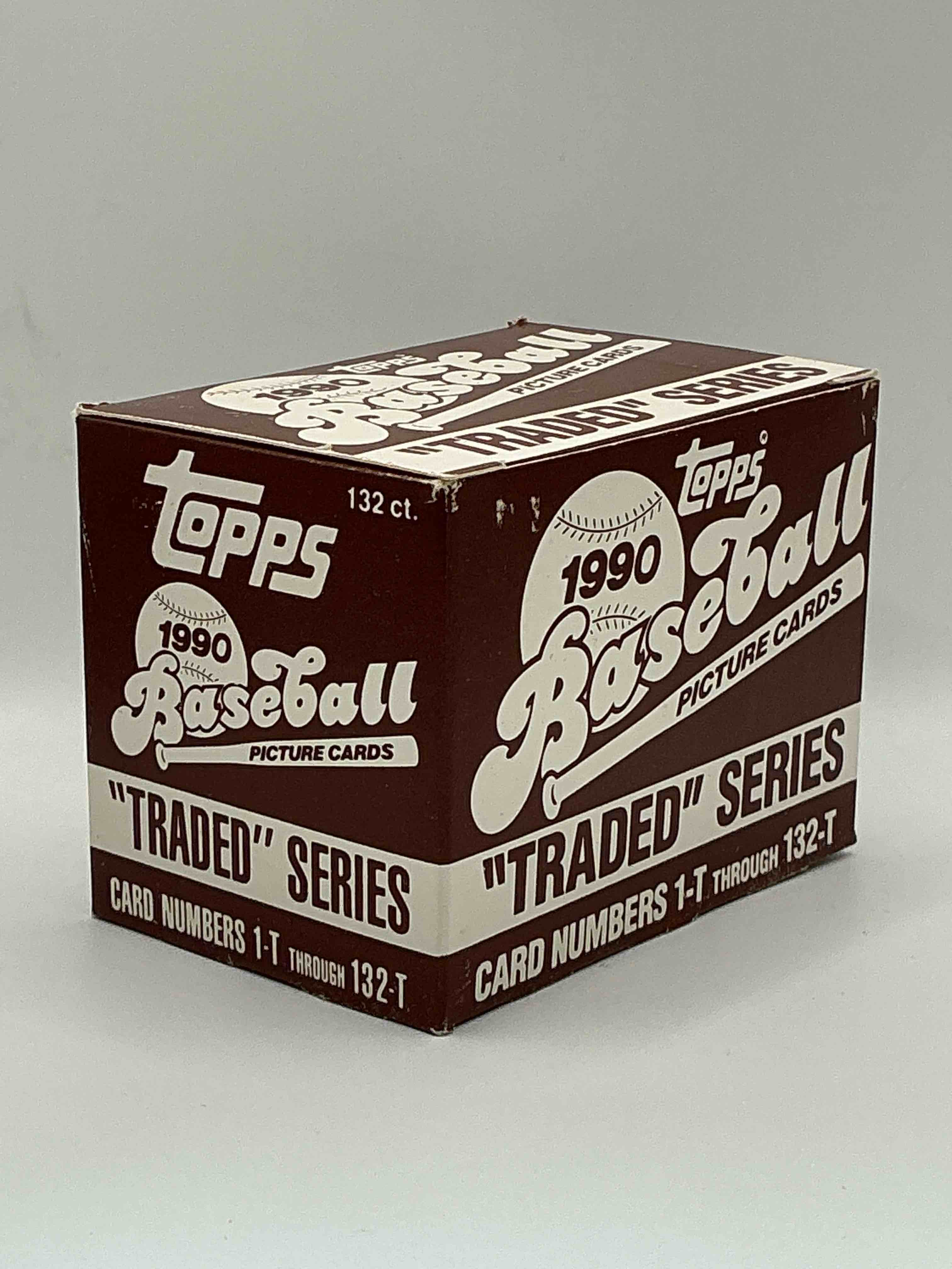 Condition photo showing New/Like New for 1990 Topps Baseball Card Complete Unopened Traded Series, Card Numbers 1-T Through 132-T. Set Is Unopened (These Sets Were Never Factory Sealed In Plastic From Manufacturer). Set Includes David Justice Traded Rookie. Great Sports Card Memorabilia!