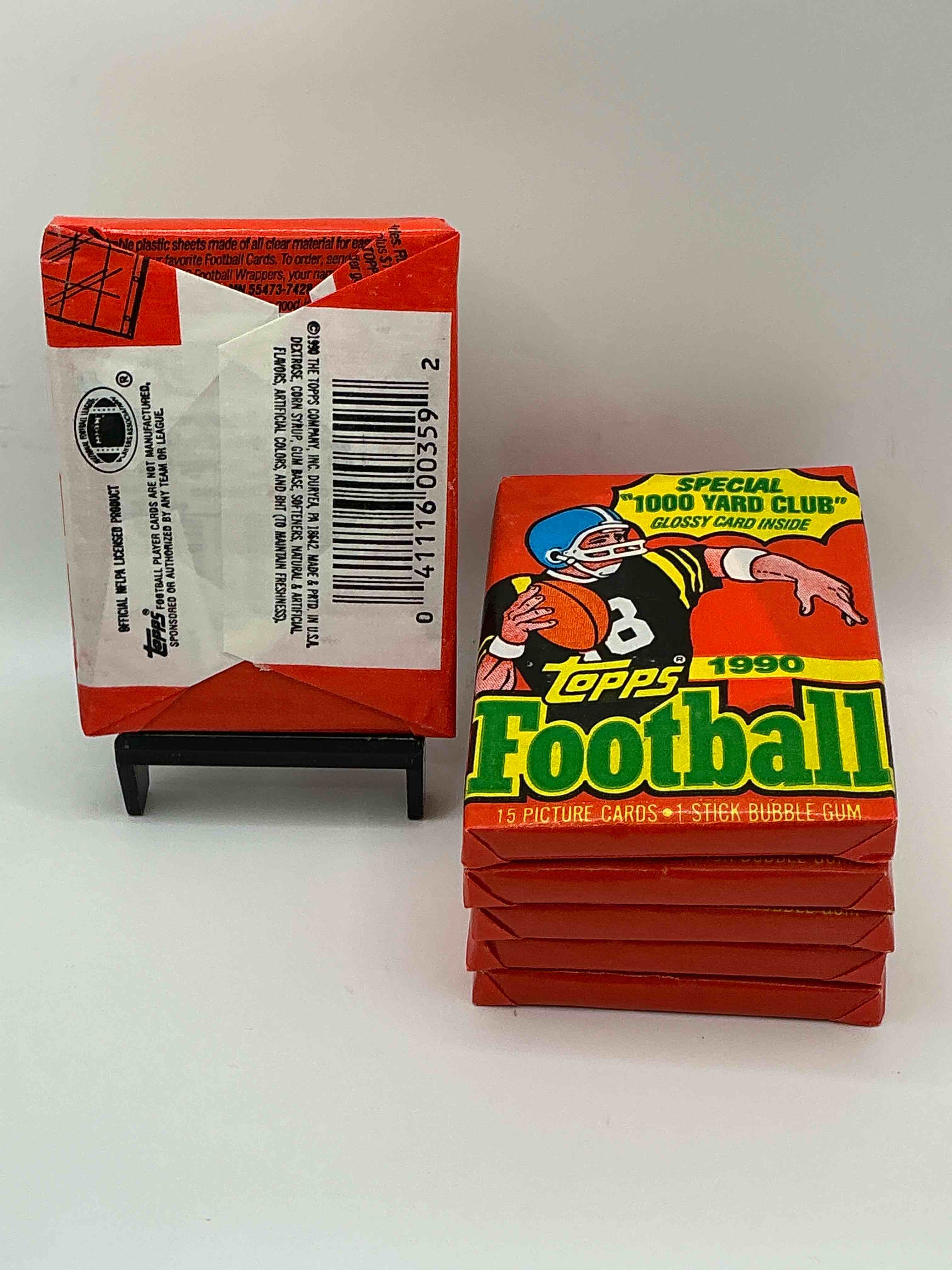 Condition photo showing New/Like New for The Last Year Of Football Wax! Joe Montana, Emmitt Smith & Barry Sanders!? 1990 Topps Football Unopened Sports Card Wax Pack, Direct From Original Retail Box! Getting Hard To Find! Search For Early Barry Sanders & Jerry Rice & So Much More!