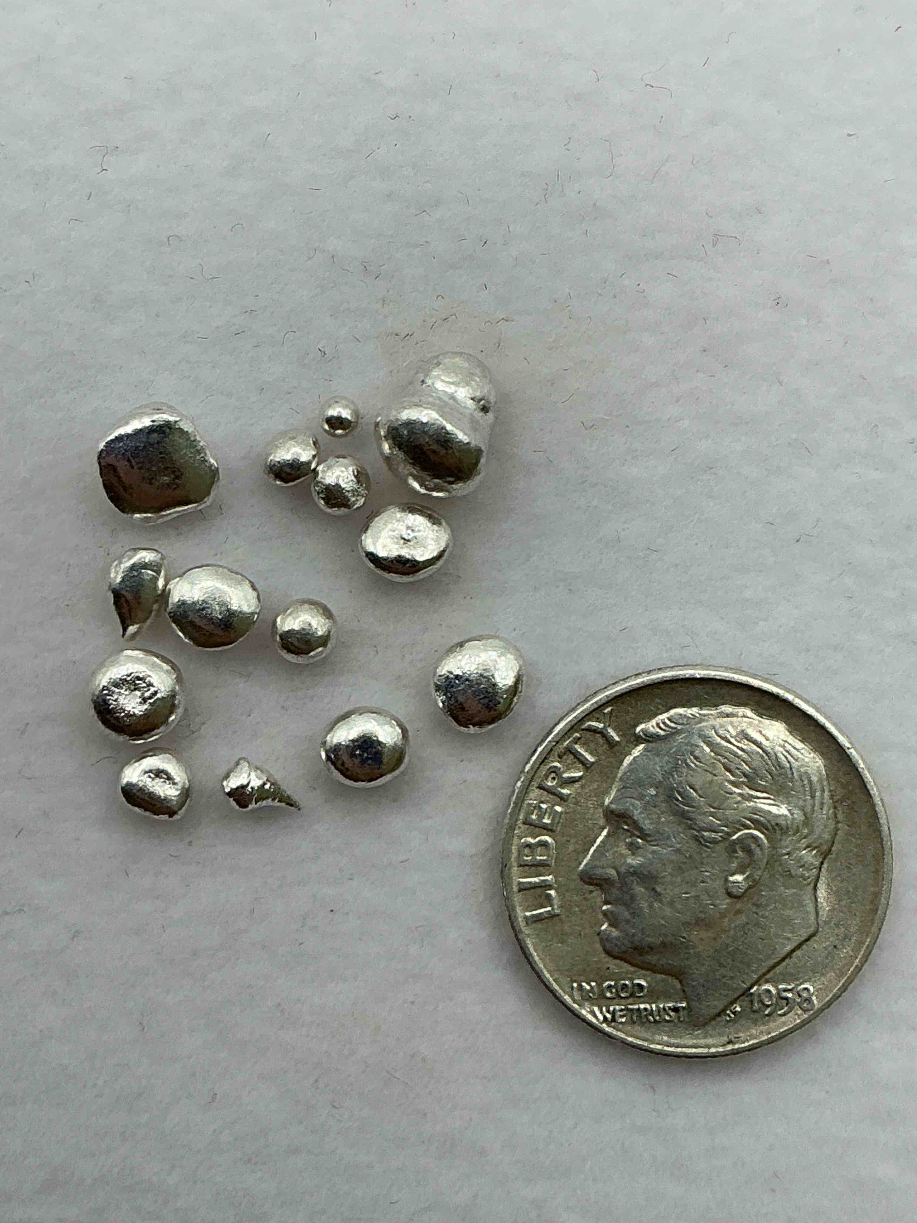 Condition photo showing New/Like New for Silver Nuggets! .999 US Fine Silver, In Small Nugget Form! Total Weight Of All Nuggets In Lot Approximately 3 Grams, Bid Is Per Nugget! A Cool Way To Invest In Fine US Silver! Includes Collector Capsule!