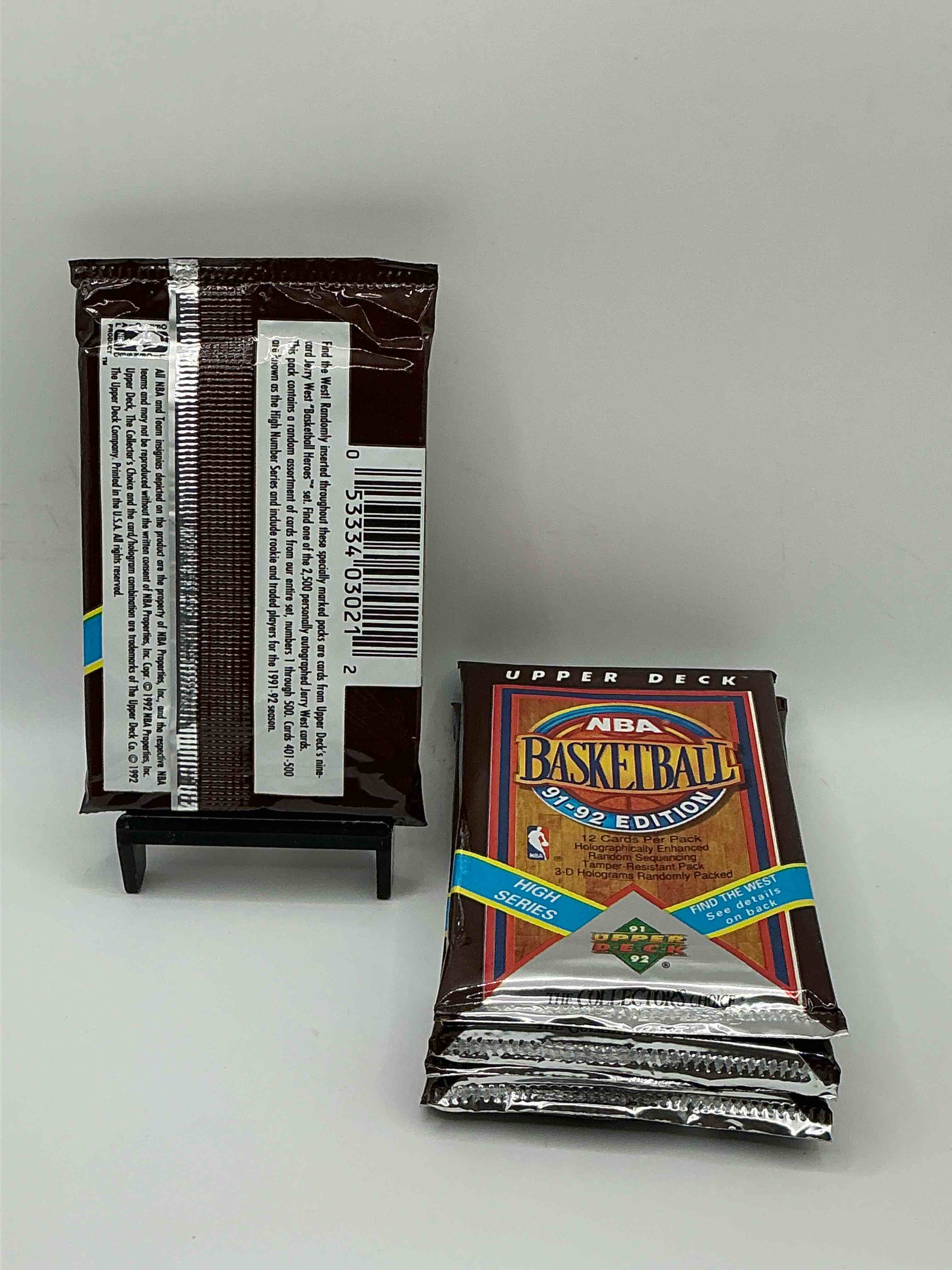 Condition photo showing New/Like New for Wow, Find The West! 1991/92 HIGH SERIES Upper Deck NBA Basketball Sealed Pack, Direct From Original Sealed Retail Case! Potential To Find A Jerry West Signature Card Only In This High Series... Super Rare! Also Search For Valuable Michael Jordans & Too Many Great Cards To List! An Awesome Investment In Sports Card Memorabilia! You May Never See These Again, Super Rare!