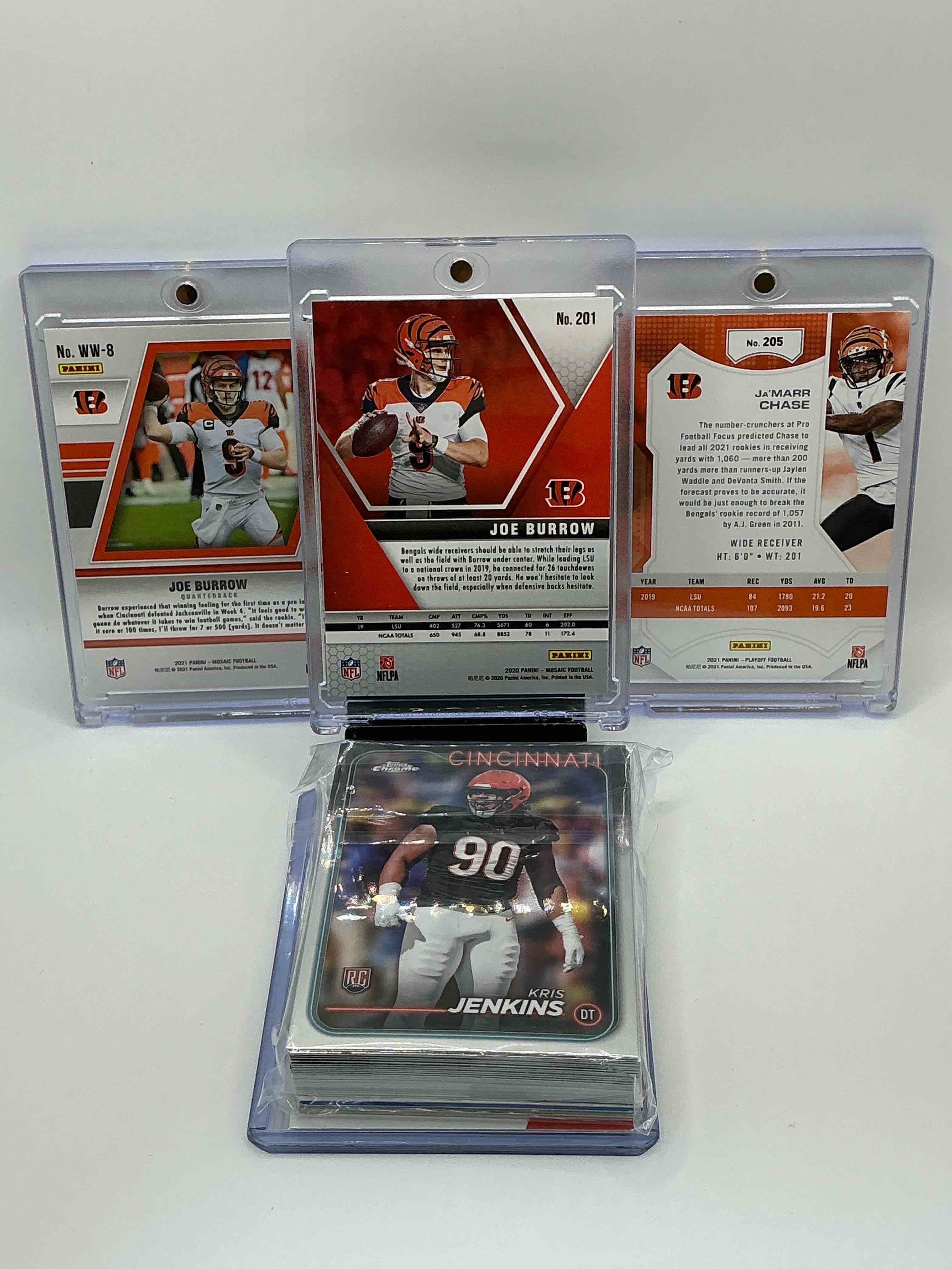 Condition photo showing New/Like New for Bengals Bonanza! 2020 Silver & Orange Mosaic Joe Burrow Rookie, 2021 Rainbow Mosaic Will To Win Joe Burrow Second Year, 2021 Panini Playoff Orange and White Ja’marr Chase Rookie! Along With 50 Other Bengals Heroes, Legends, Rookies & Commons!
