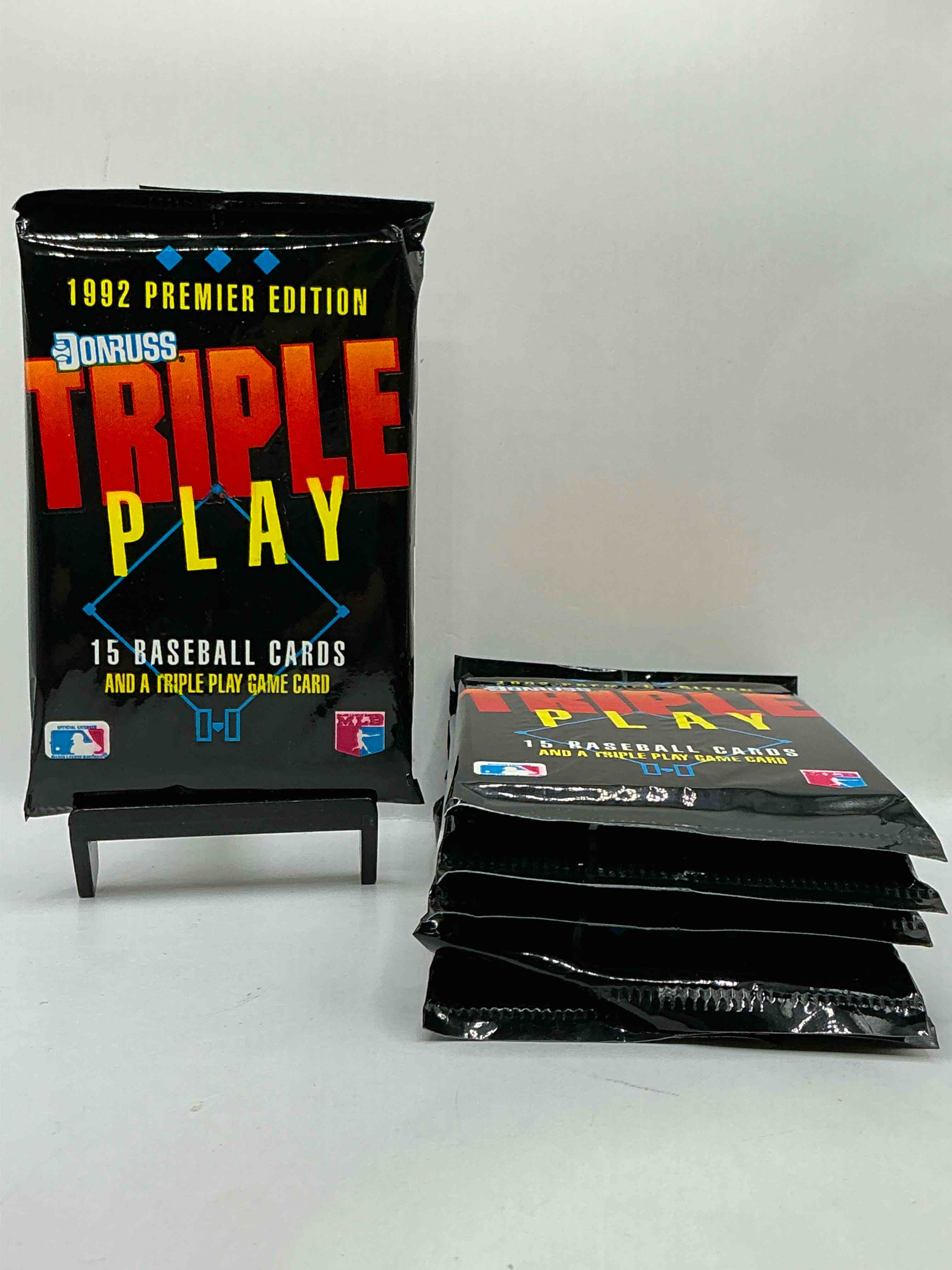 1992 donruss triple play mlb baseball card packs! look for randomly inserted gallery of the stars cards, awesome action, little hotshots & rub off game cards!along with griffey jr, mcgwire, ryan & more! rare packs!