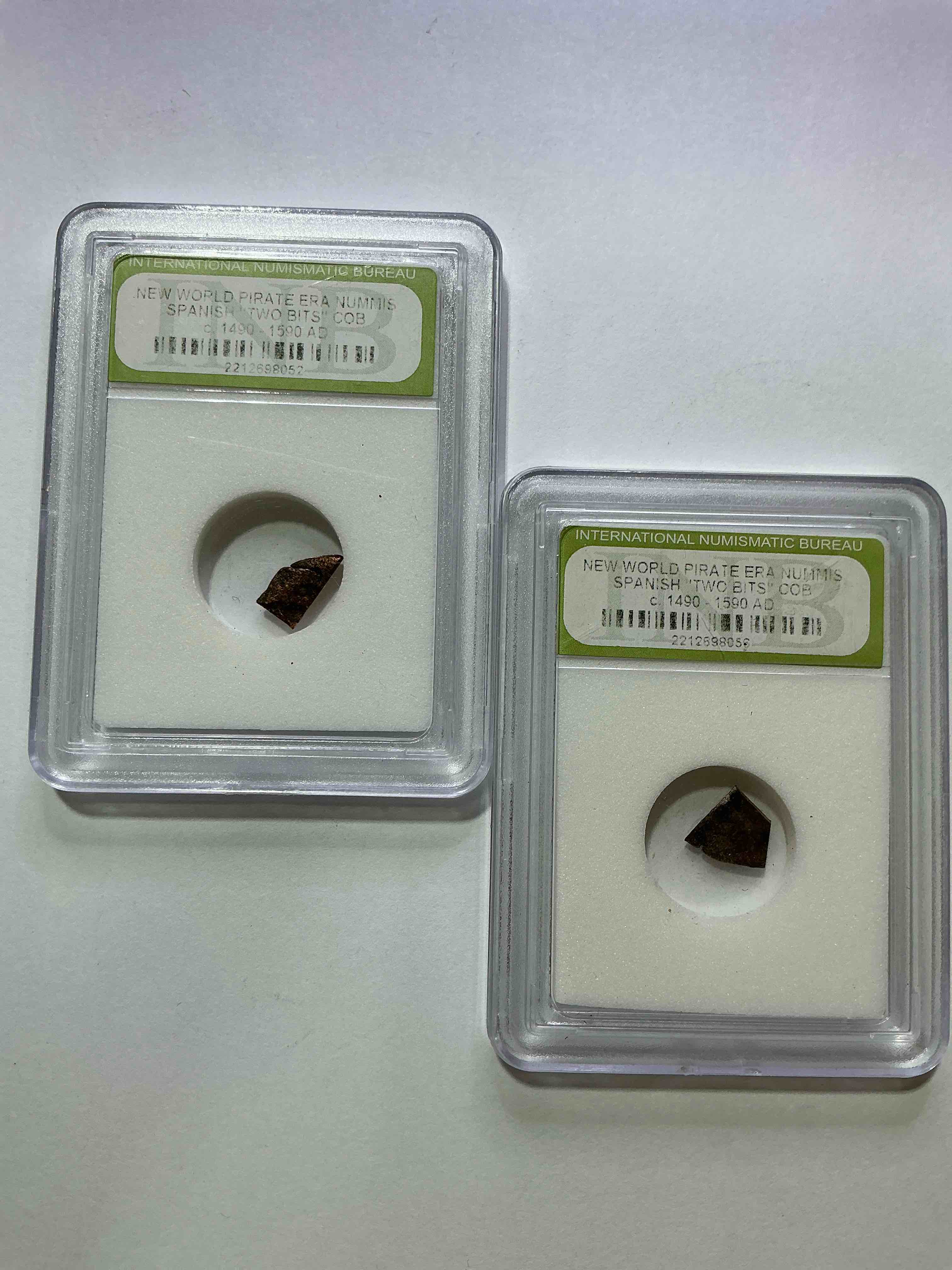 pirate era spanish "two bits" coin, authentic! circa 1490-1590, 400 to 500 years old! these copper "two bit" pieces were hand cut off larger coins in the golden pirate age to create smaller denominations. a genuine piece of cool history! a great authentic pirate era collectible encased in inb slab!