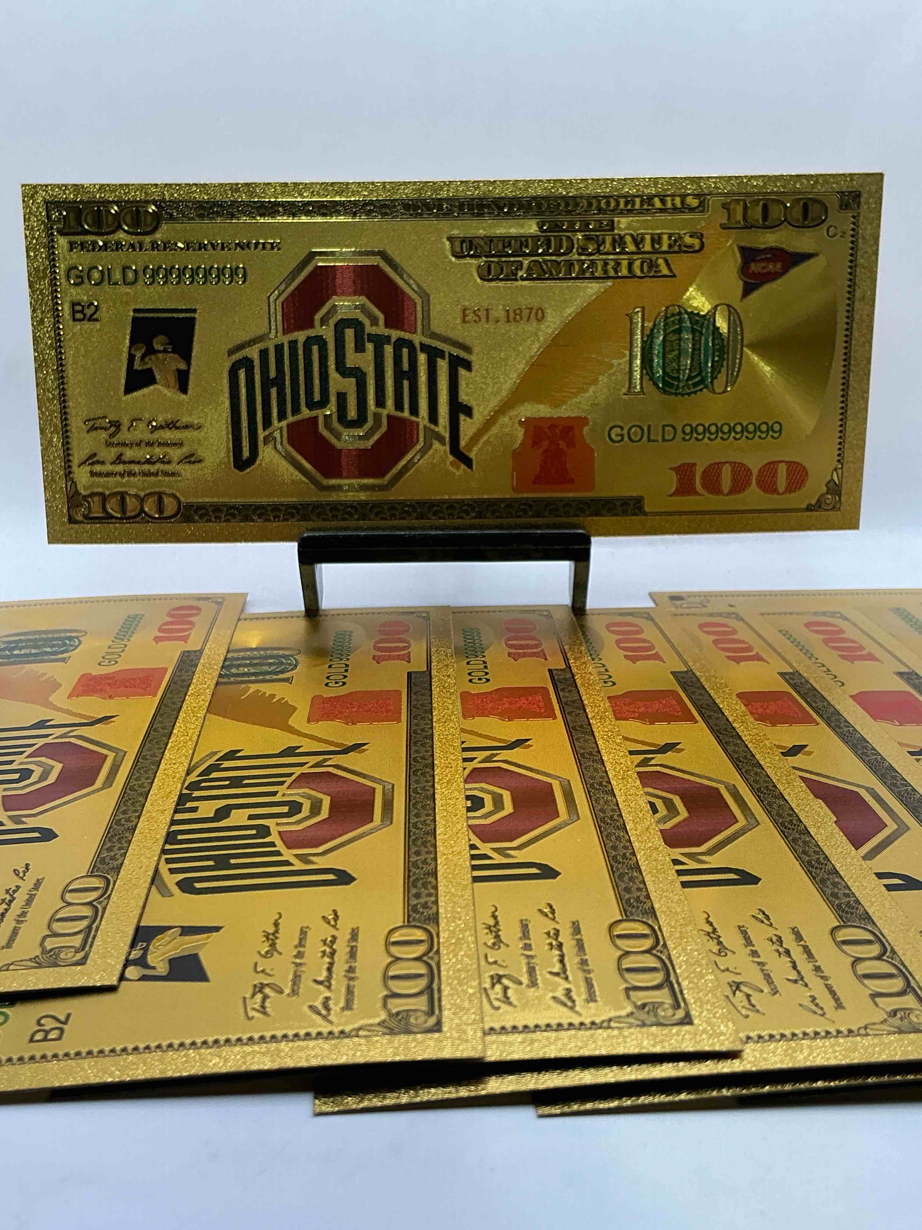 Ohio State University Collectible Memorabilia! Super Cool, Gold In Color 100 Dollar Commemorative Ohio State University Bill! Cool Designs On Front & Back Of Bill! OSU Fans Rejoice, Cool Memorabilia! Plastic Bills With Cool Designs!