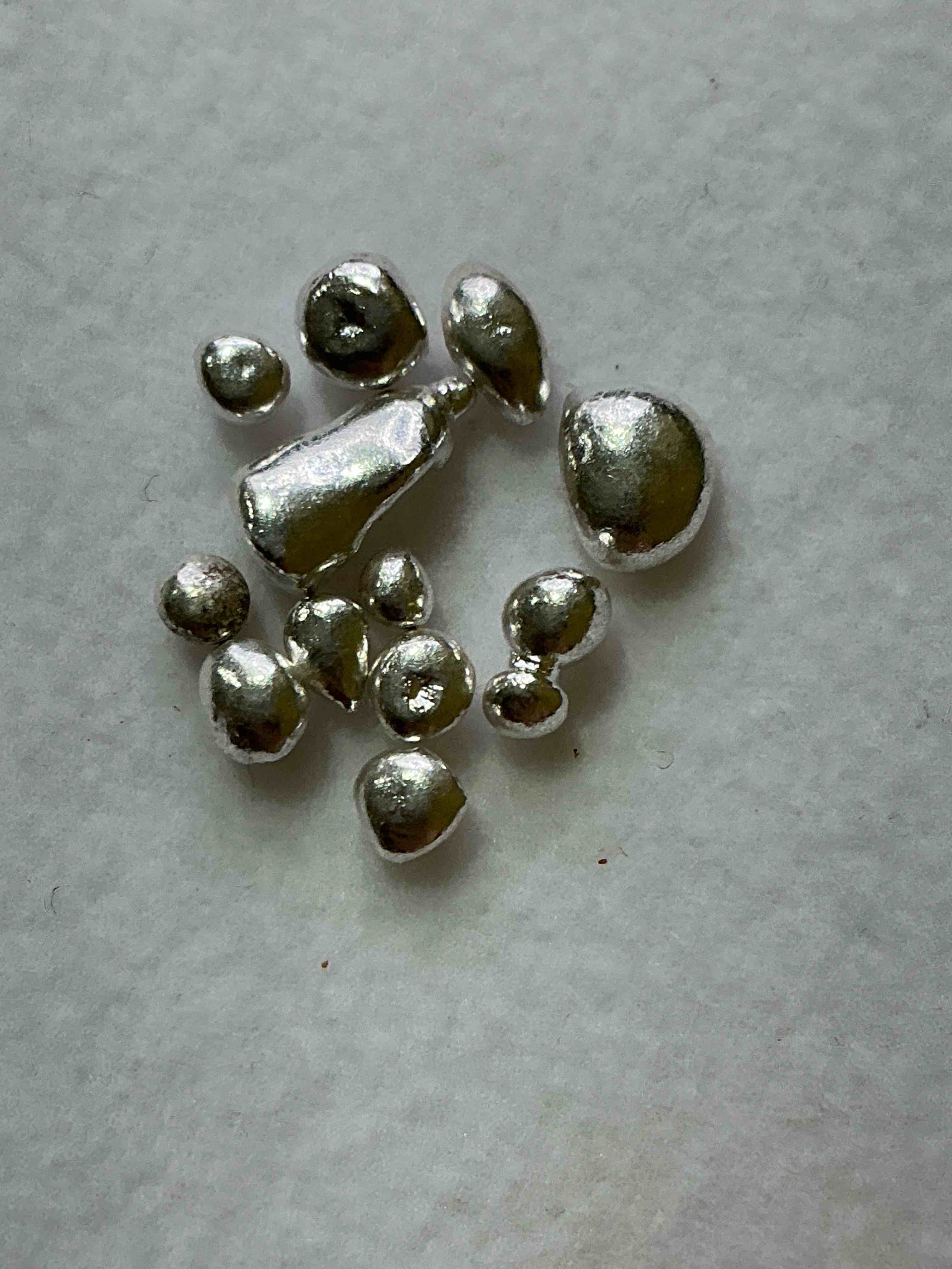 Silver Nuggets! .999 US Fine Silver, In Small Nugget Form! Total Weight Of All Nuggets In Lot Approximately 3 Grams, Bid Is Per Nugget! A Cool Way To Invest In Fine US Silver! Includes Collector Capsule!