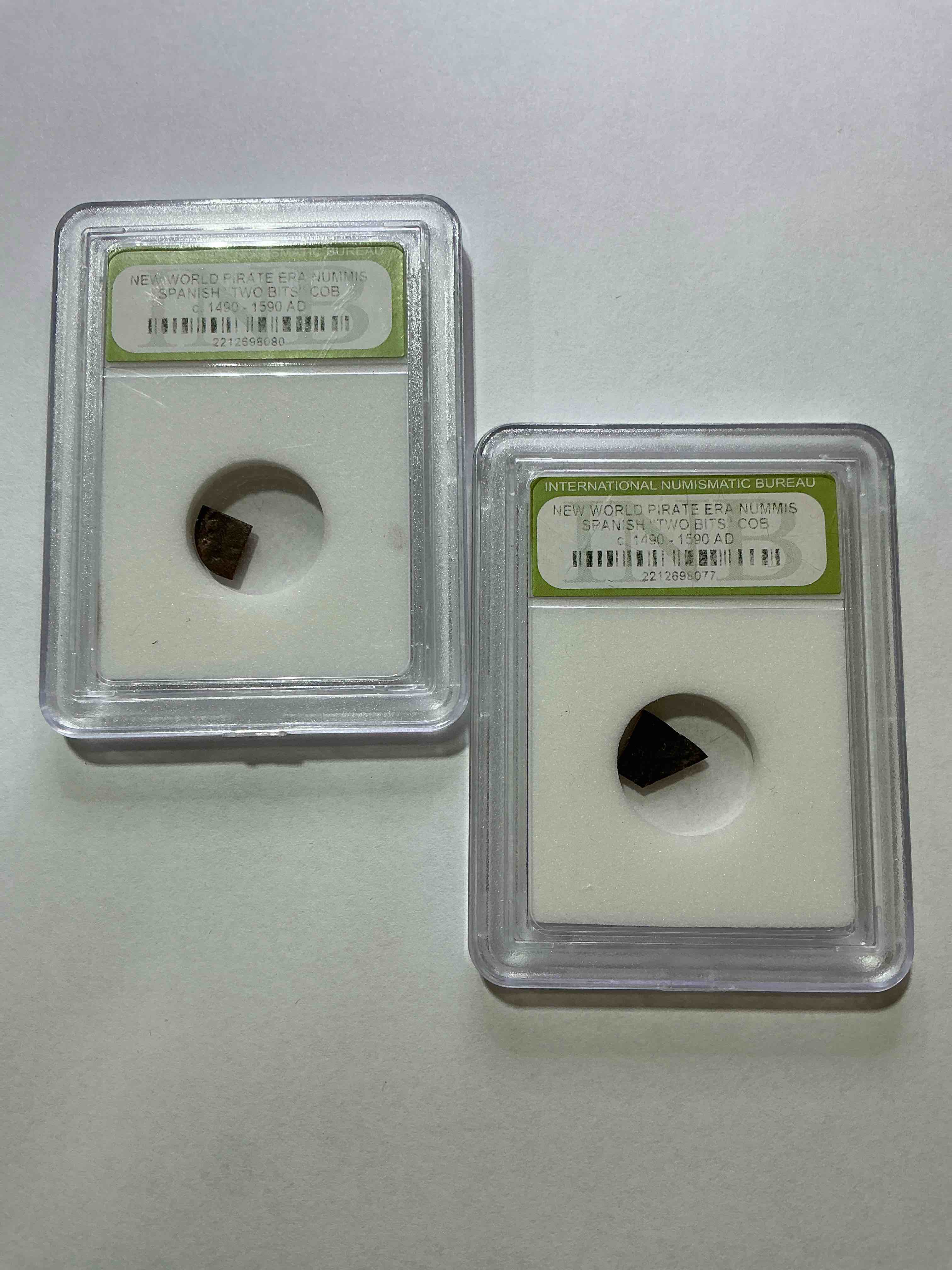 pirate era spanish "two bits" coin, authentic! circa 1490-1590, 400 to 500 years old! these copper "two bit" pieces were hand cut off larger coins in the golden pirate age to create smaller denominations. a genuine piece of cool history! a great authentic pirate era collectible encased in inb slab!