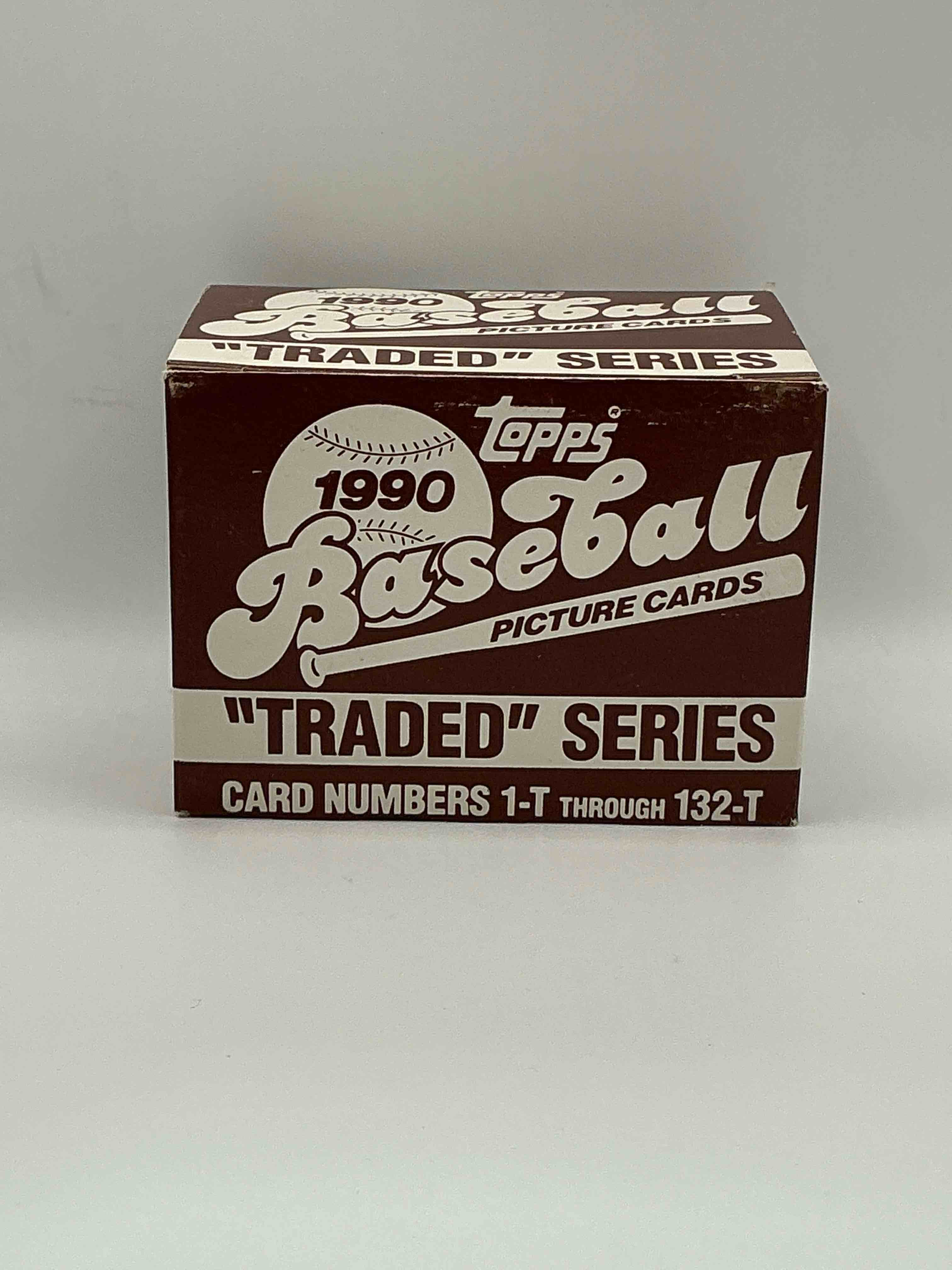 1990 Topps Baseball Card Complete Unopened Traded Series, Card Numbers 1-T Through 132-T. Set Is Unopened (These Sets Were Never Factory Sealed In Plastic From Manufacturer). Set Includes David Justice Traded Rookie. Great Sports Card Memorabilia!