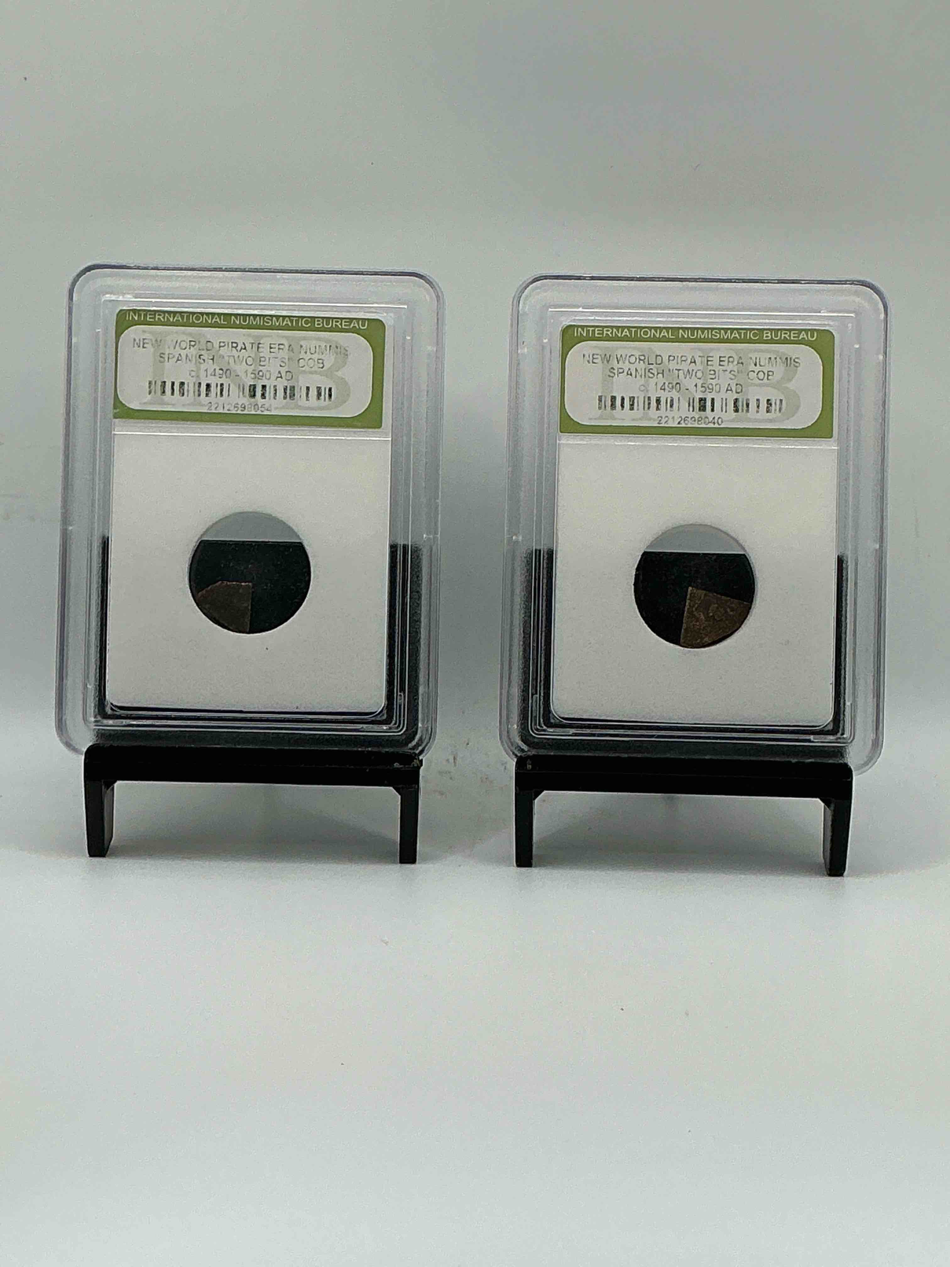 Pirate Era Spanish "Two Bits" Coin, Authentic! Circa 1490-1590, 400 To 500 Years Old! These Copper "Two Bit" Pieces Were Hand Cut Off Larger Coins In The Golden Pirate Age To Create Smaller Denominations. A Genuine Piece Of Cool History! A Great Authentic Pirate Era Collectible Encased In INB Slab!