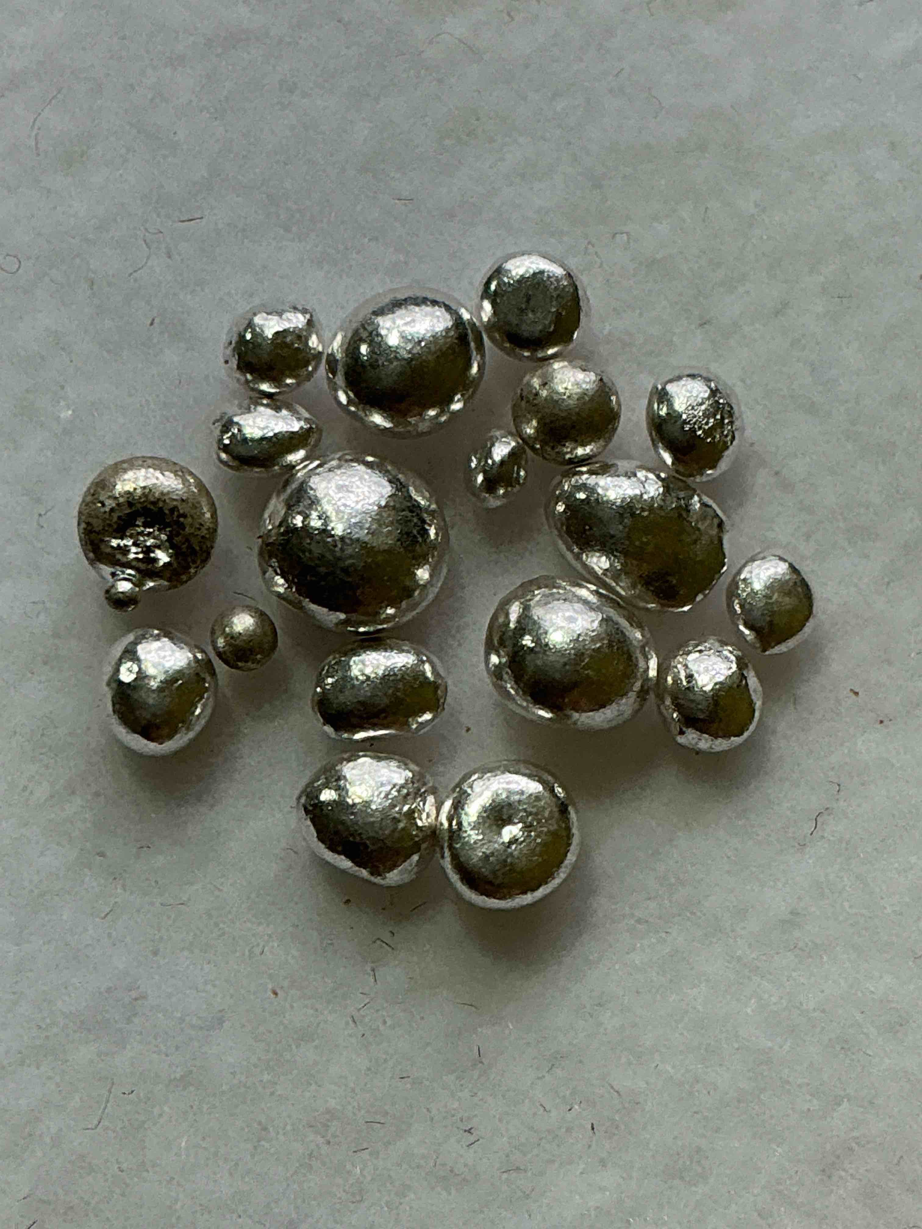 Silver Nuggets! .999 US Fine Silver, In Small Nugget Form! Total Weight Of All Nuggets In Lot Approximately 3 Grams, Bid Is Per Nugget! A Cool Way To Invest In Fine US Silver! Includes Collector Capsule!