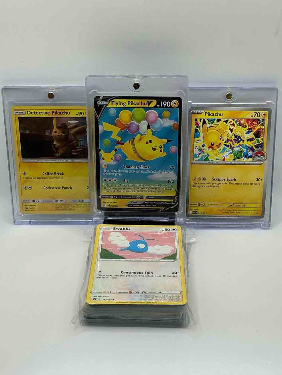 pokémon & pikachu palooza! black and blue ballon thunder shock fly flying pikachu, yellow shimmer coffee break corkscrew punch detective pikachu, yellow lightning shock scrappy spark pikachu! along with 50 other pokémon heroes, holos, legends & commons!
