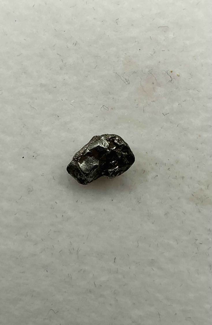 genuine meteorite piece! nugget of nantan meteorite which was discovered in 1958 & fell from the sky in china in the year 1516! very rare & near impossible to get! own an authentic piece of meteorite that fell from the sky in 1958!  