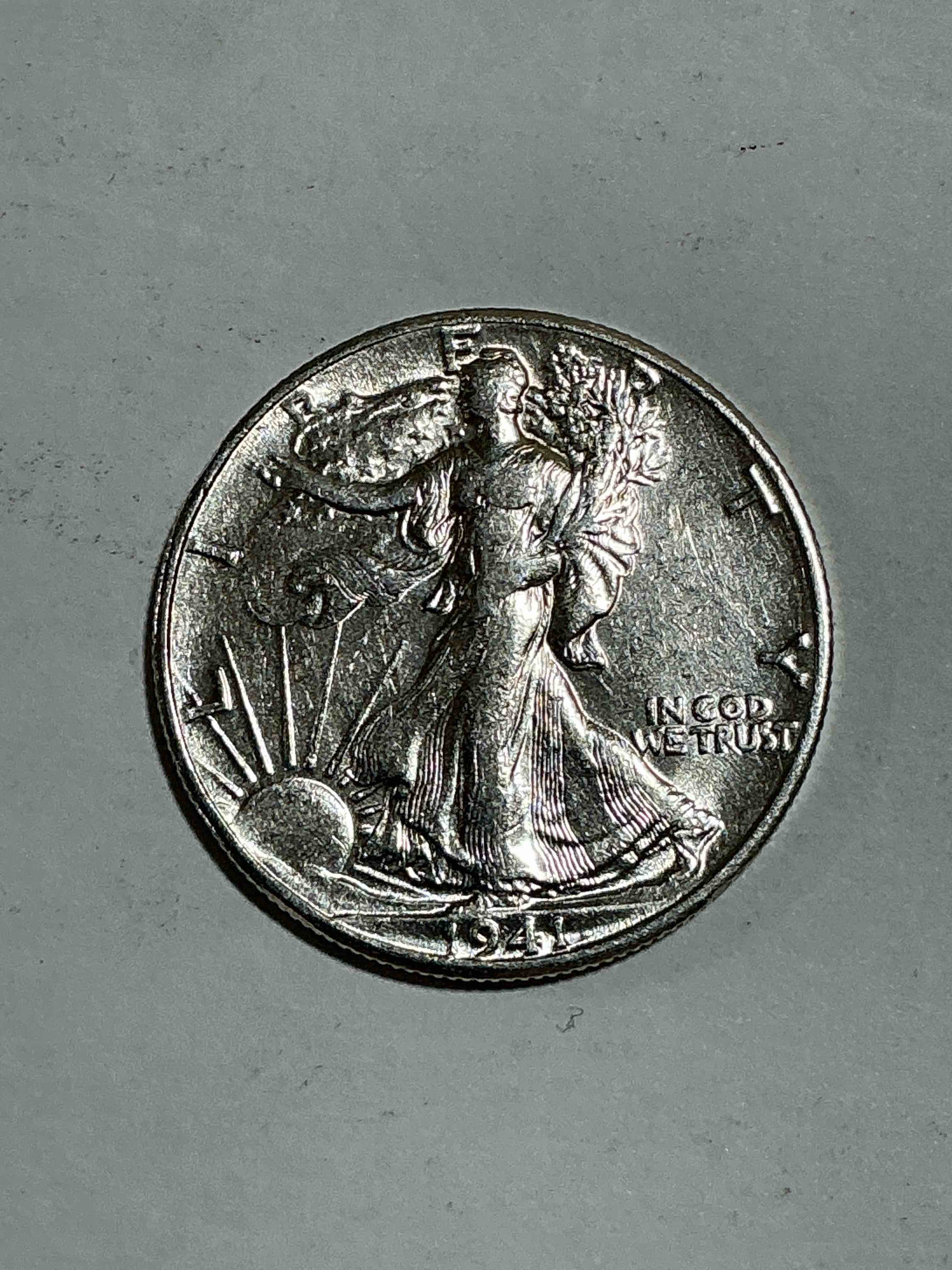 World War II Era Silver! Antique U.S. Silver! Liberty Walking Silver Fine U.S. Silver Half Dollar! This Striking Half Dollar Was Minted From 1916-1947 & Have Become Some Of The Most Collectible Coins In History! Here  Is A Striking Circulated Example From 1941! Uncirculated! Liberty Walking Coins Are 90% Fine U.S. Silver, A Great Investment In Precious Metal!