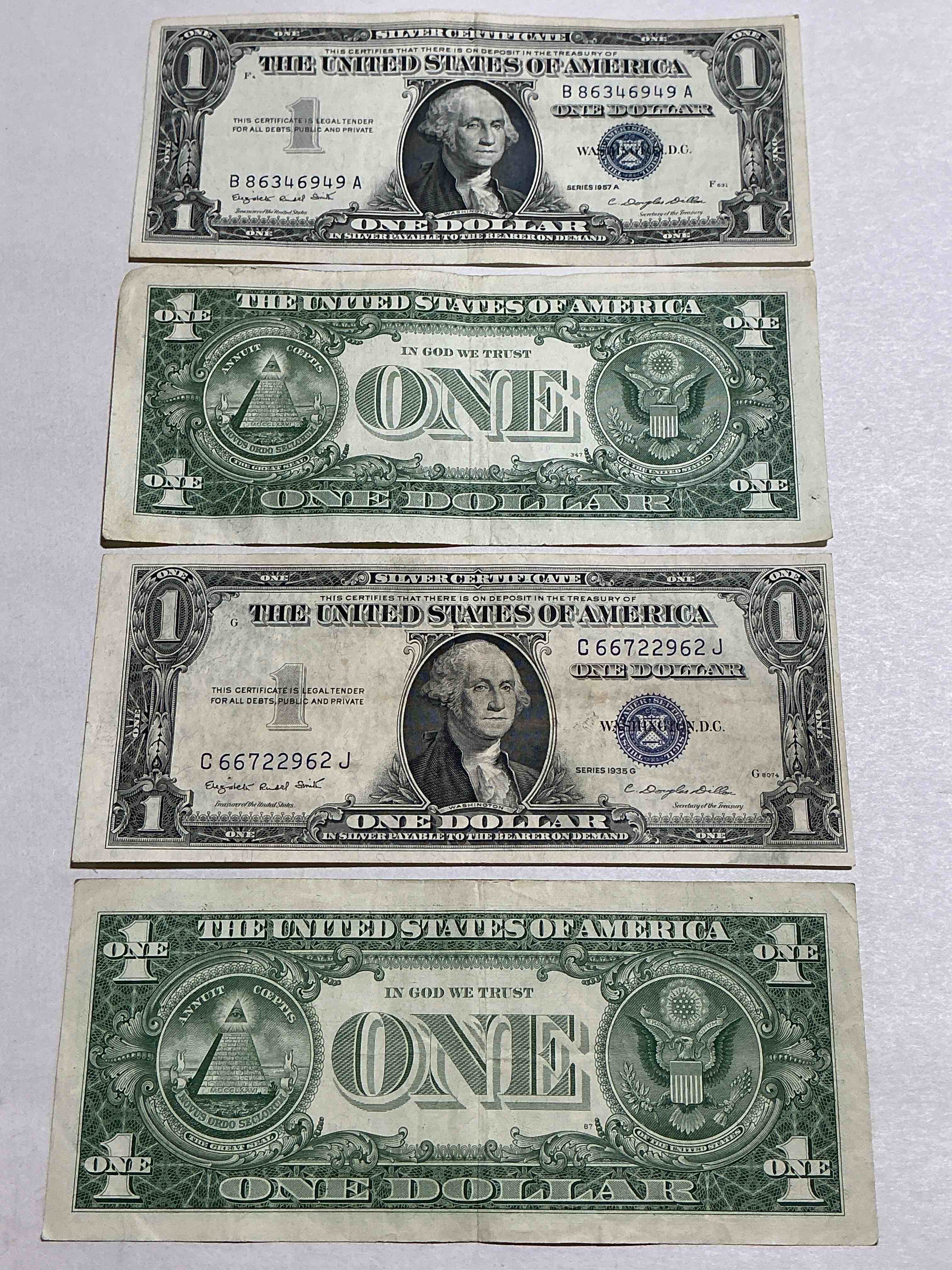1957 & 1935 Silver Certificates! Did You Know That Prior To 1964 One Dollar U.S. Paper Money Was Actually Redeemable For Silver Dollars?! Wow How Times Have Changed! Silver Certificates Were Produced From 1878 To 1964 & Are Still Considered Legal Tender At Face Value. Here Are Gorgeous, Circulated 1935 & 1957 U.S. One Dollar Silver Certificate, With Highly Collectible "Blue Seal!* Own An Awesome Piece Of History!