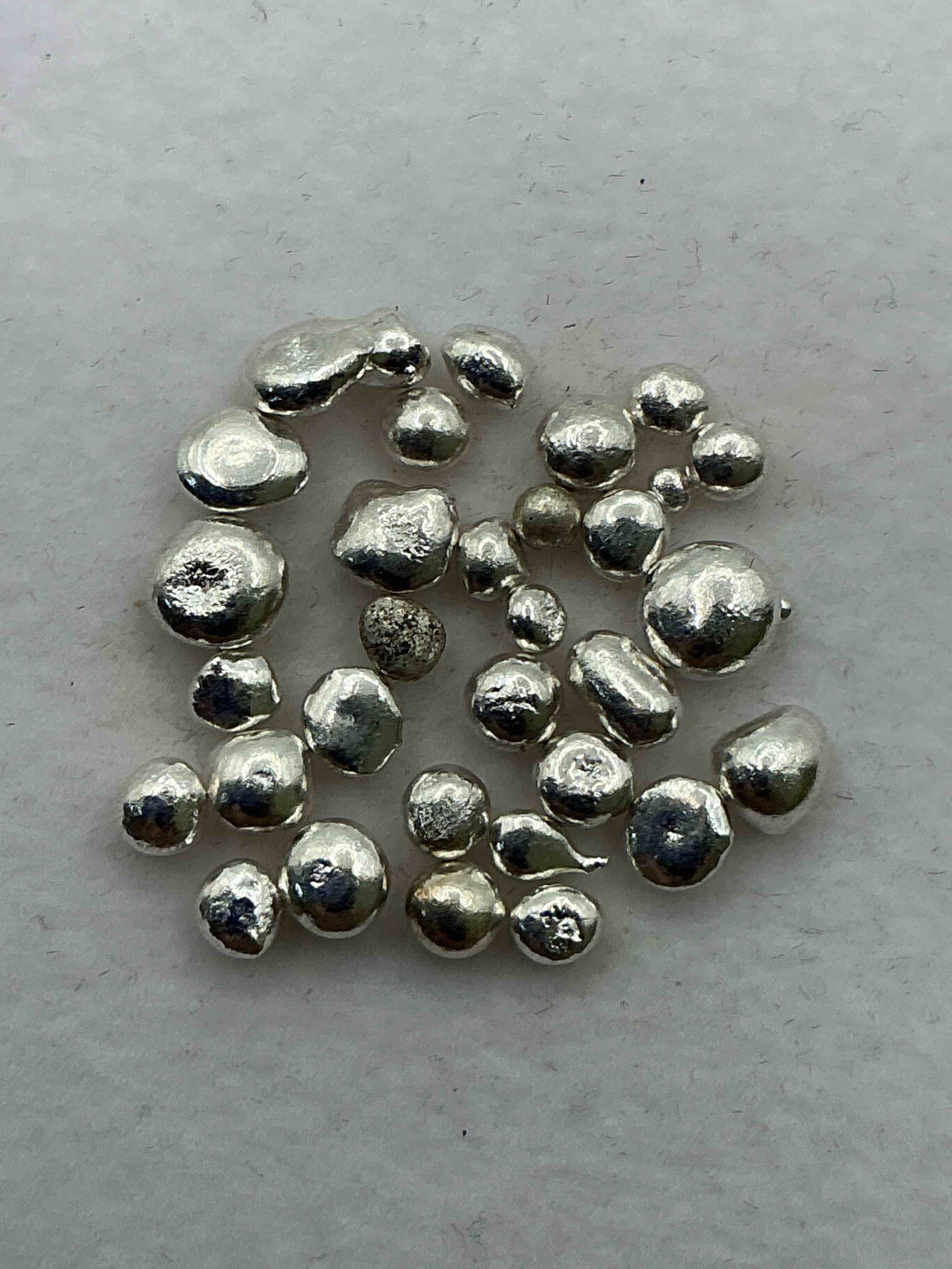 Silver Nuggets! .999 US Fine Silver, In Small Nugget Form! Total Weight Of All Nuggets In Lot Approximately 3 Grams, Bid Is Per Nugget! A Cool Way To Invest In Fine US Silver! Includes Collector Capsule!