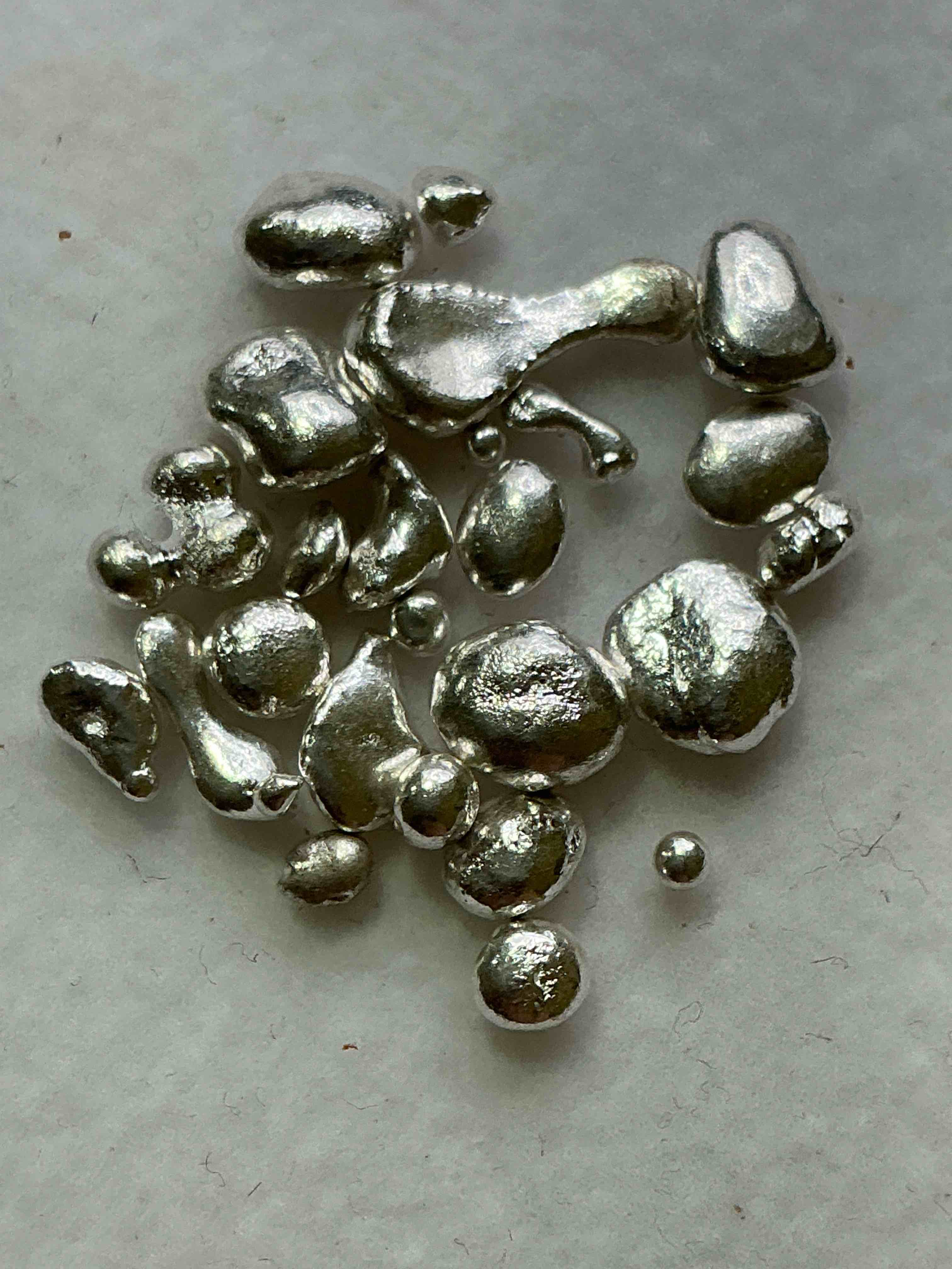 Silver Nuggets! .999 US Fine Silver, In Small Nugget Form! Total Weight Of All Nuggets In Lot Approximately 3 Grams, Bid Is Per Nugget! A Cool Way To Invest In Fine US Silver! Includes Collector Capsule!