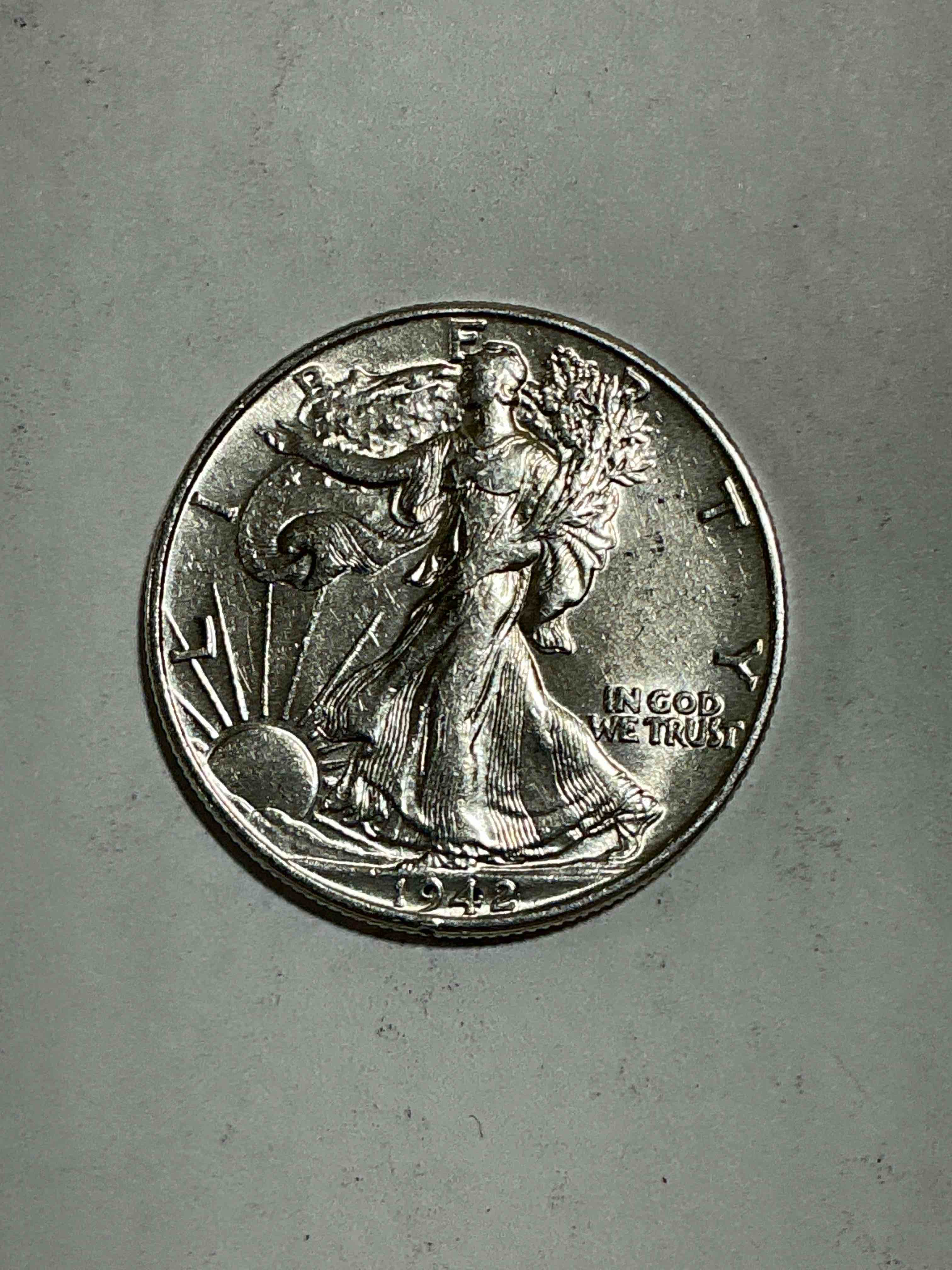 World War II Era Silver! Antique U.S. Silver! Liberty Walking Silver Fine U.S. Silver Half Dollar! This Striking Half Dollars Were Minted From 1916-1947 & Have Become Some Of The Most Collectible Coins In History! Here Is A Striking Circulated ExampleFrom 1942! Liberty Walking Coins Are 90% Fine U.S. Silver, A Great Investment In Precious Metal!