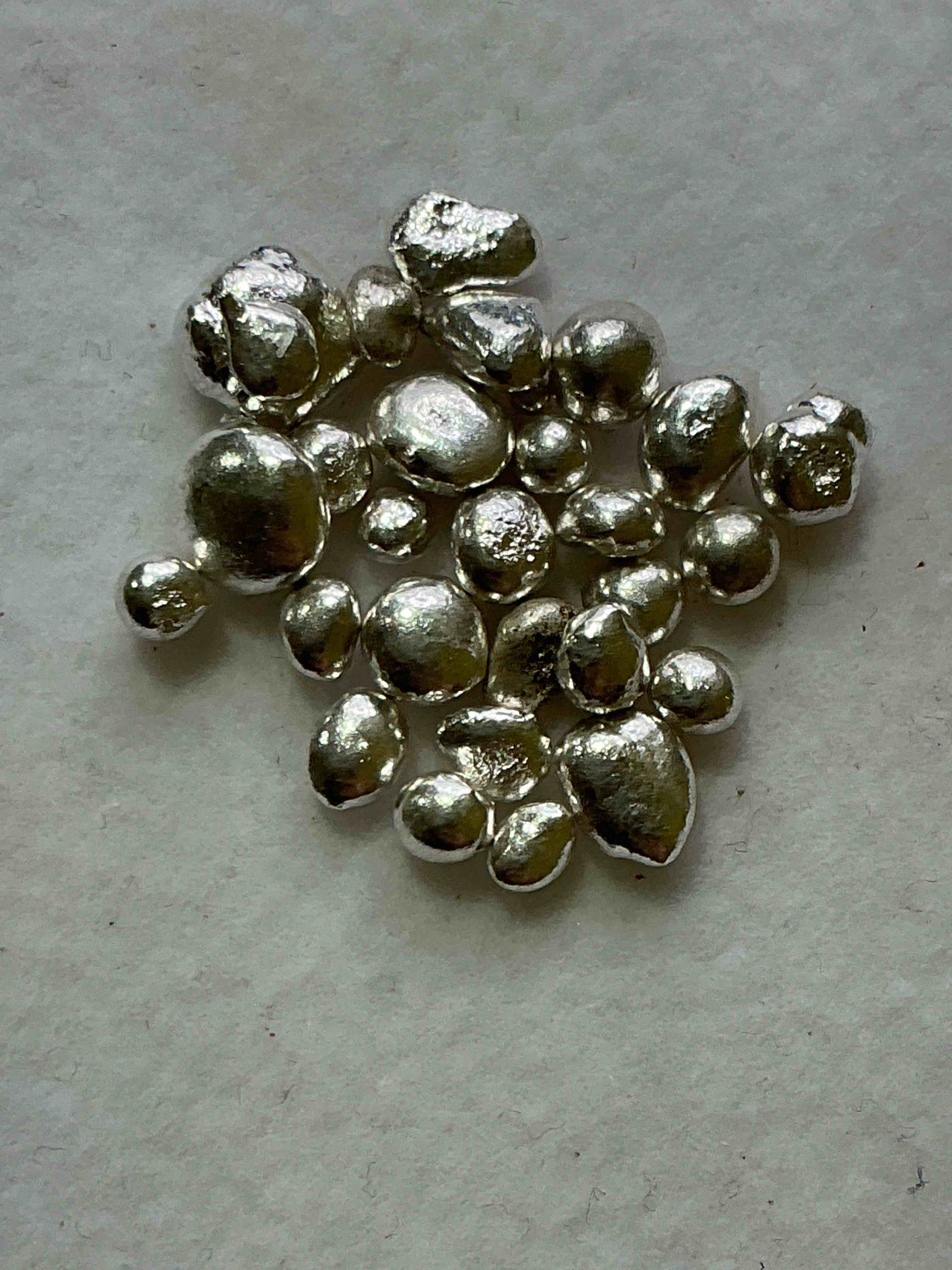 Silver Nuggets! .999 US Fine Silver, In Small Nugget Form! Total Weight Of All Nuggets In Lot Approximately 3 Grams, Bid Is Per Nugget! A Cool Way To Invest In Fine US Silver! Includes Collector Capsule!