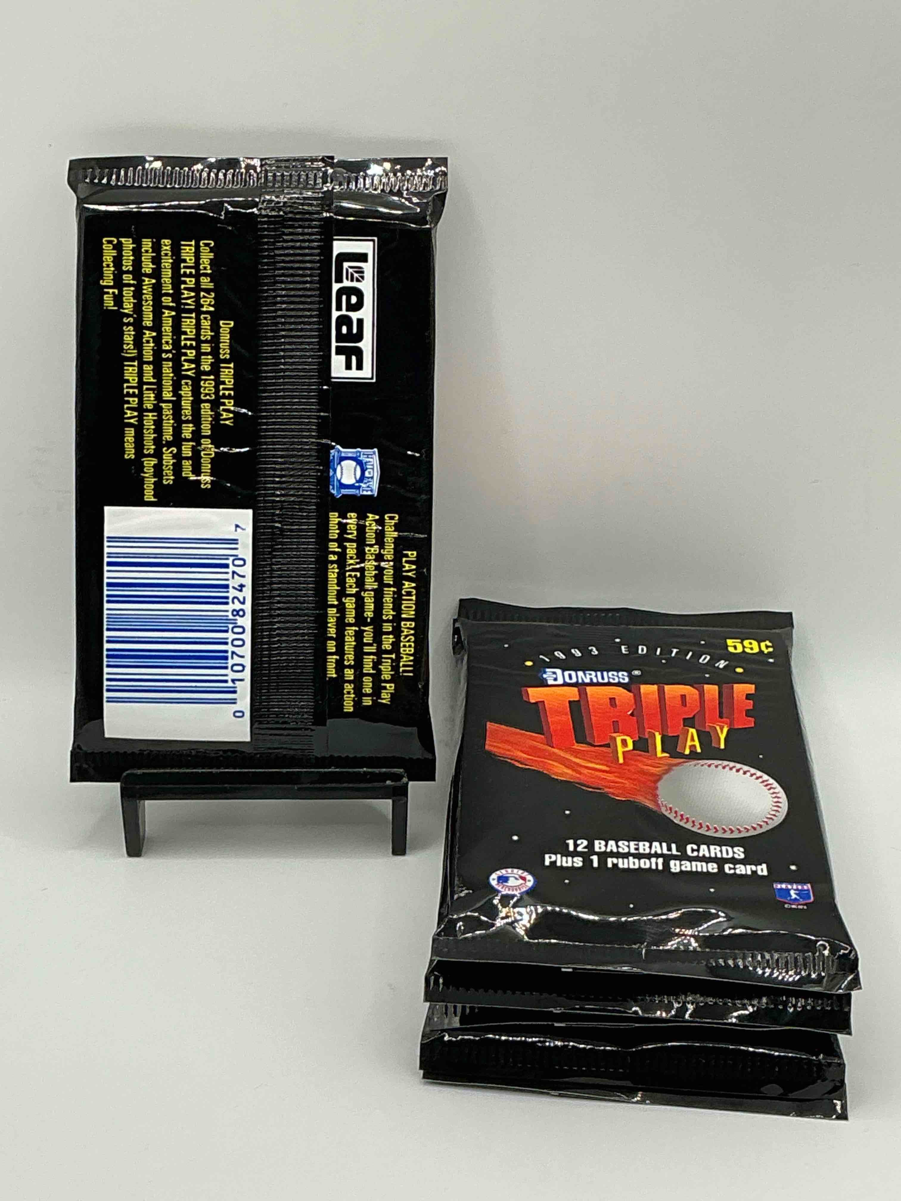 Condition photo showing New/Like New for 1993 Donruss Triple Play MLB Baseball 18 Card Packs! Look For 1 Ruboff Game Cards Along With Griffey Jr, McGwire, Ryan & More! Rare Packs!