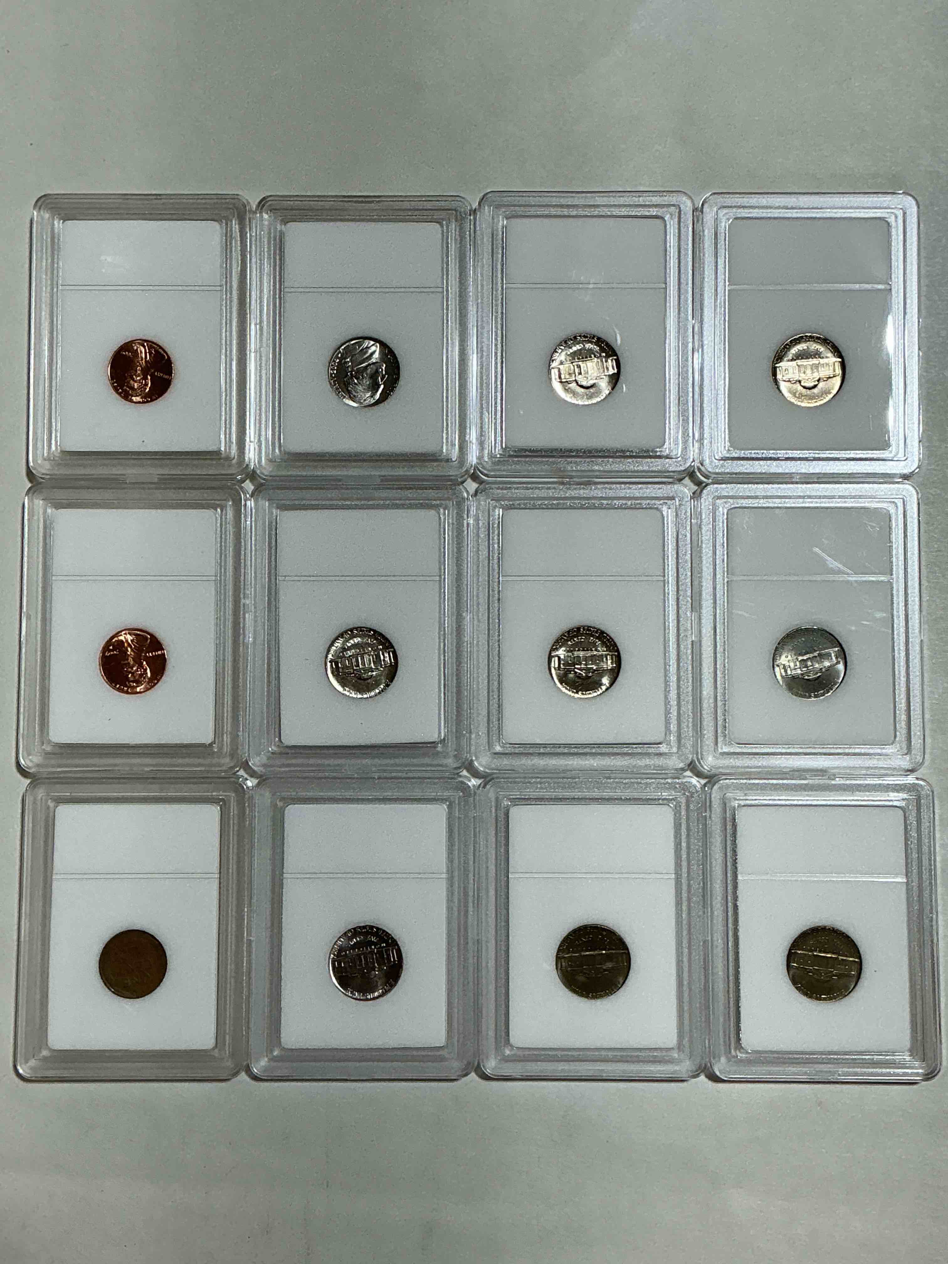 Condition photo showing New/Like New for Collector's Dream! 12 Different Rare, Slabbed U.S. Collector Coins In Certified/Catalogued Protective Slab Cases! A Great Way to Build An Incredible Collection Of Protected, Rare U.S. Coins! Great For The Coin Fan & Collector!
