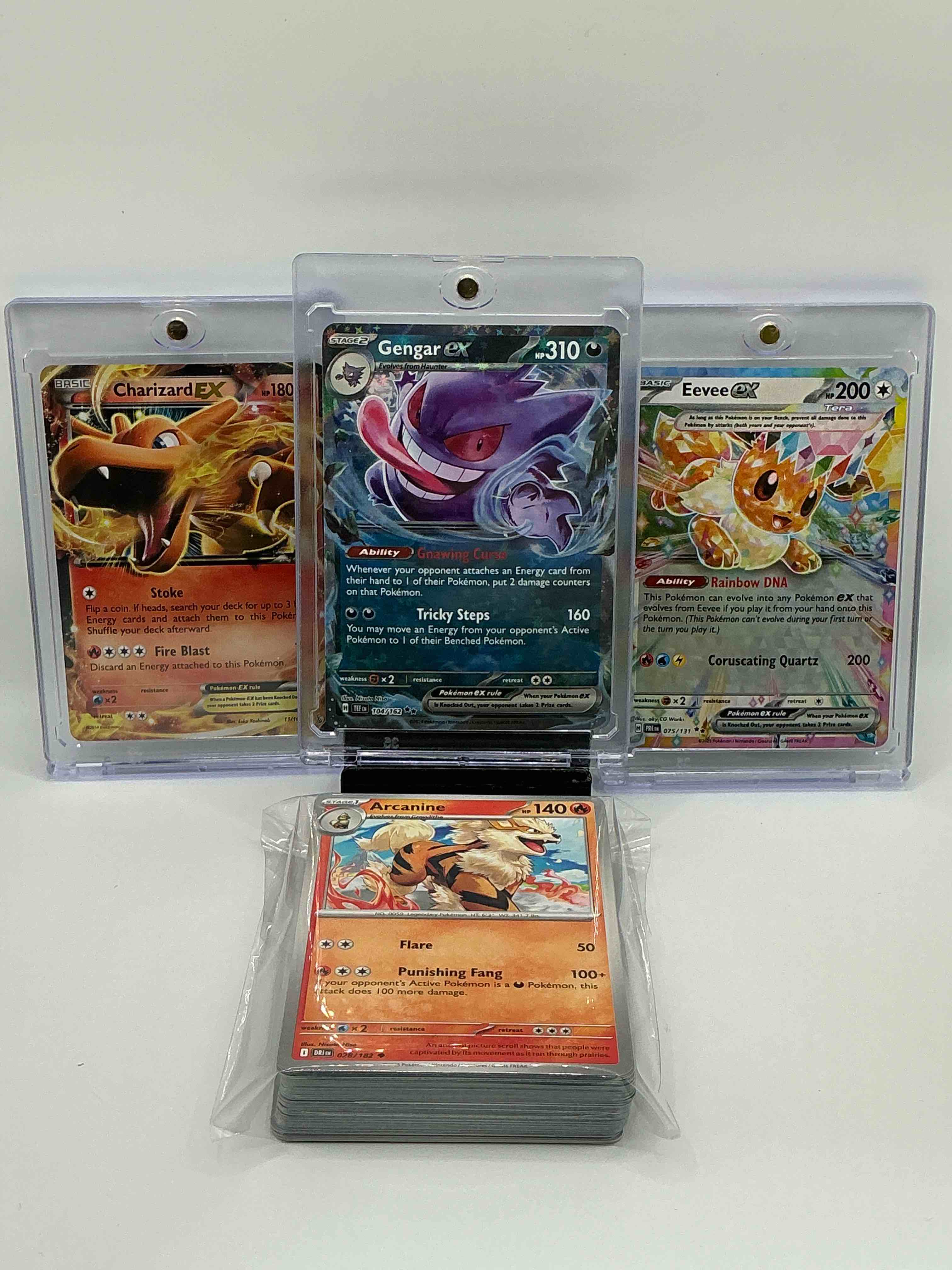 Pokémon Palooza! Silver & Blue Shimmer Gnawing Curse Tricky Steps Gengar EX, Silver Color-Blast Rainbow DNA Coruscating Quartz Eevee EX, Orange & Black Fire Stoke Fire Blast Charizard EX! Along With 50 Other Pokémon Heroes, Legends & Commons!