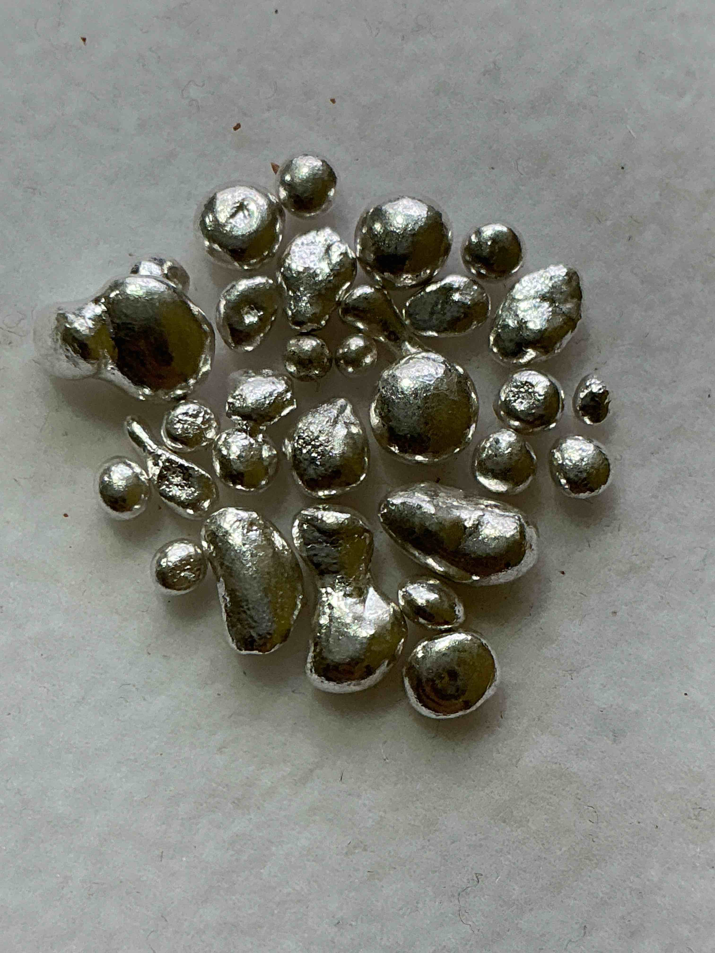 Silver Nuggets! .999 US Fine Silver, In Small Nugget Form! Total Weight Of All Nuggets In Lot Approximately 6 Grams, Bid Is Per Nugget! A Cool Way To Invest In Fine US Silver! Includes Collector Capsule!