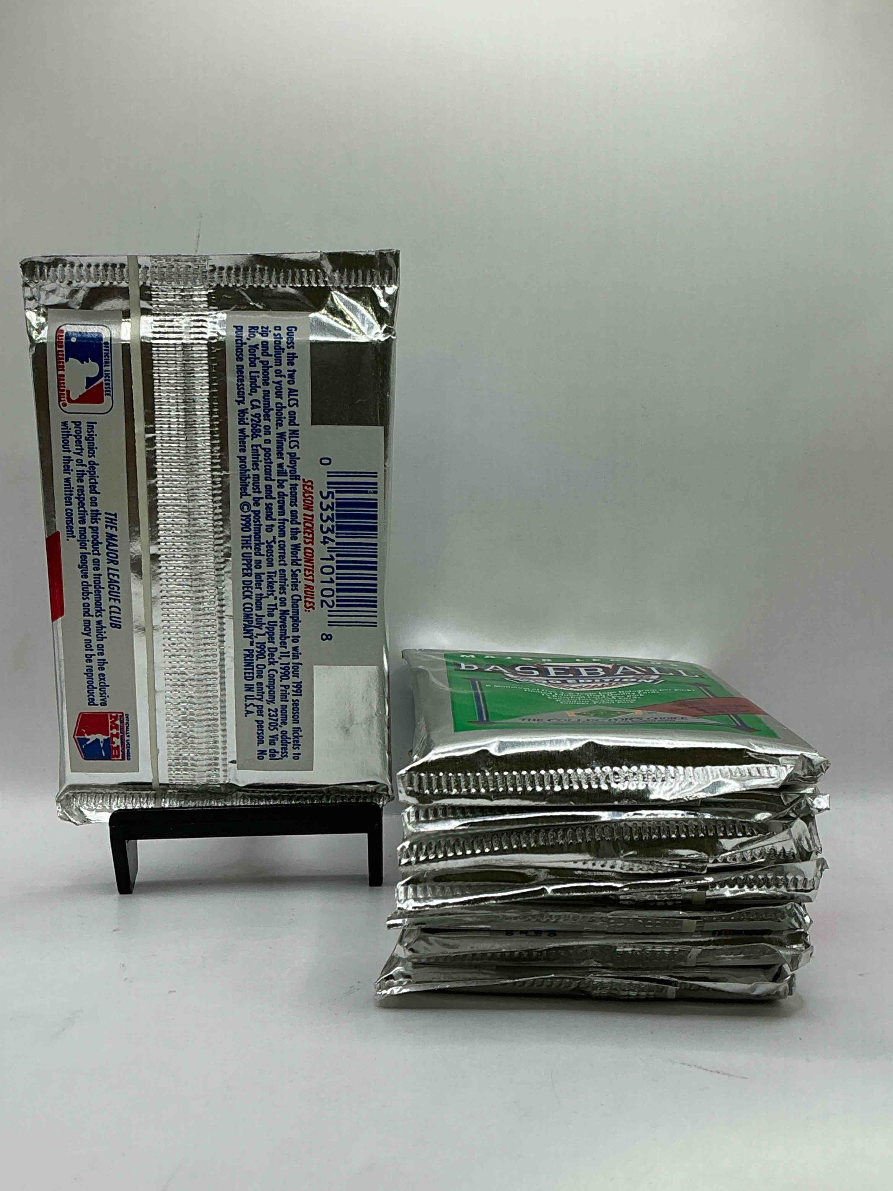 Condition photo showing New/Like New for 1990 Upper Deck Baseball Unopened Sports Trading Card Packs! Direct From Original Box! Look For Possible Collector's 3D Team Logo Card! As Well As Early Ken Griffey Jr. Cards!