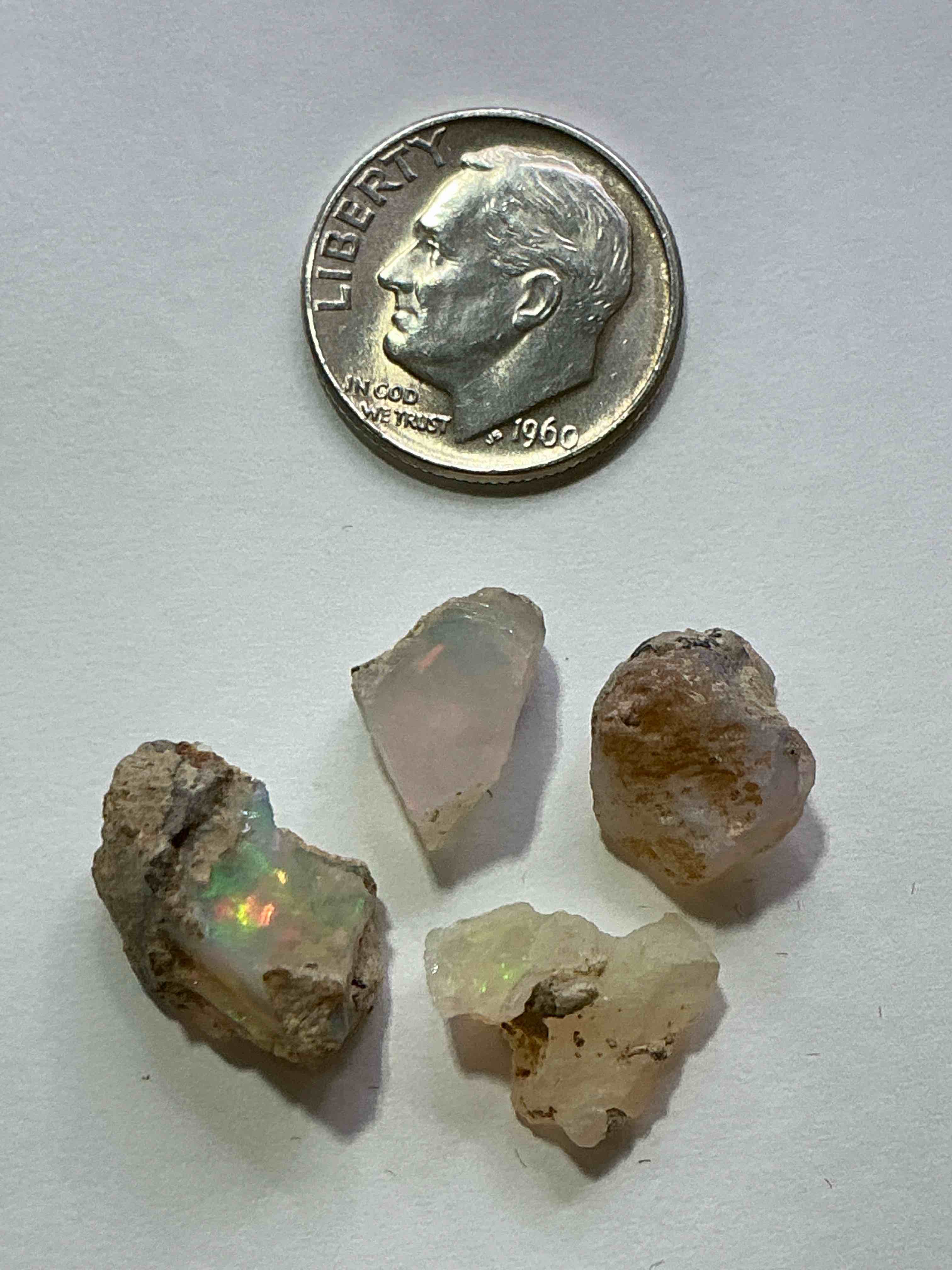 Condition photo showing Good Condition for Opal Precious Gemstone, Raw, Authentic! Ethiopian Opal Gemstone, In Large & Raw, Prospected Form! Ethiopian Opals Are Famous For Their Stunning Clarity & Shimmering Color Hues! They Are Believed To Promote Hope, Purity & Love. The U.S. Dime In Image Is For Size Reference Only (Not Included). A Gemstone Like This In Raw Form Is Very Hard To Find! Own An Amazing, Stunning, Unique Opal Gemstone In Rare, Raw Form!