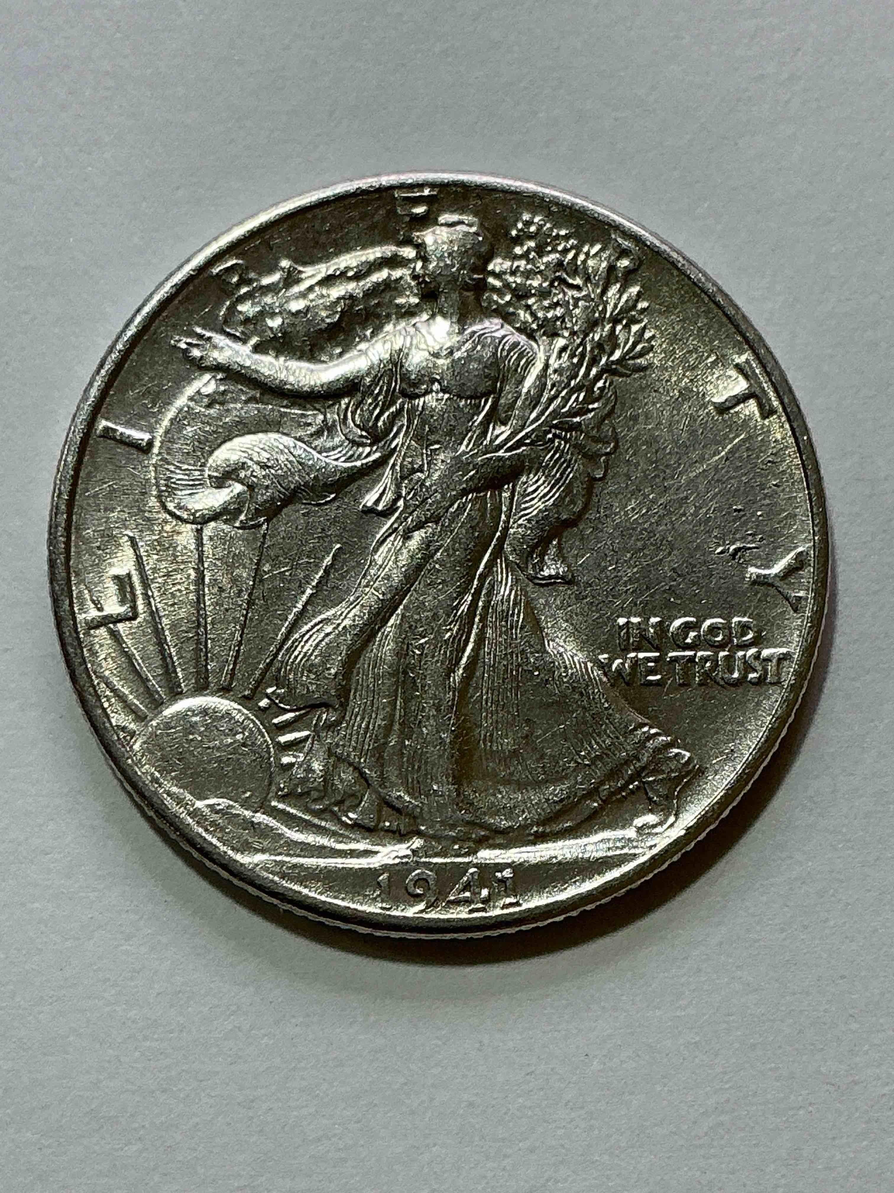 World War II Era Silver! Antique U.S. Silver! Liberty Walking Silver Fine U.S. Silver Half Dollar! This Striking Half Dollars Were Minted From 1916-1947 & Have Become Some Of The Most Collectible Coins In History! Here Is A Striking Circulated ExampleFrom 1941! Liberty Walking Coins Are 90% Fine U.S. Silver, A Great Investment In Precious Metal!