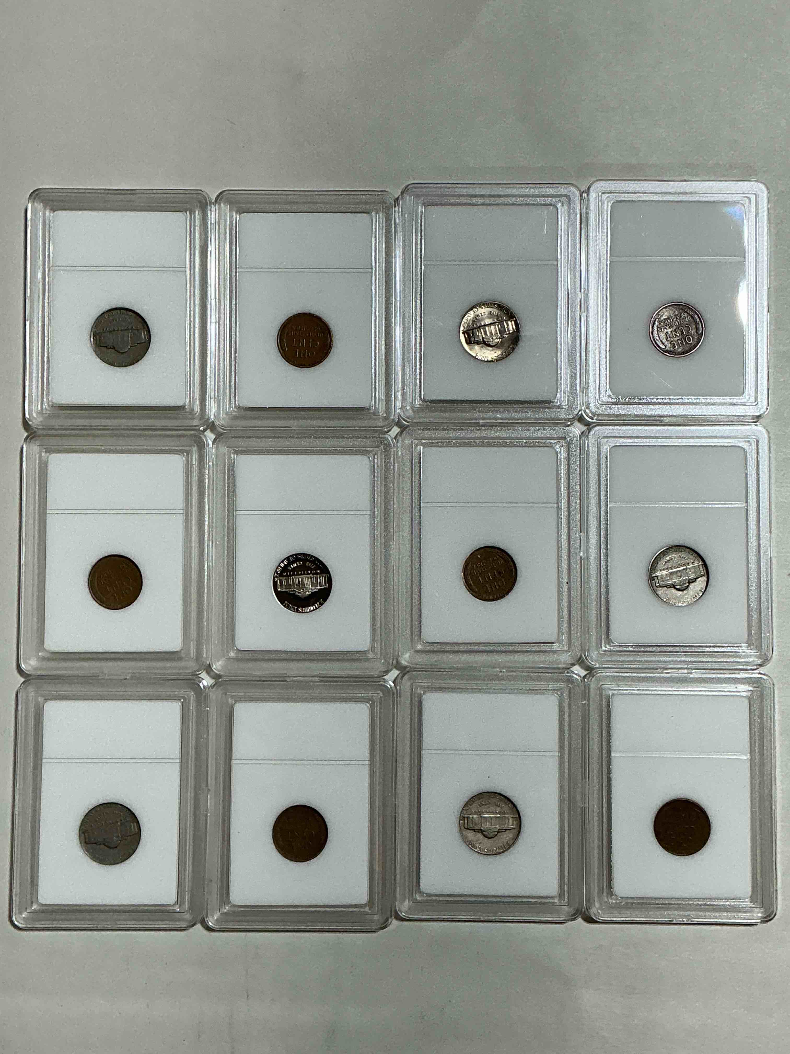 Condition photo showing Good Condition for Collector's Dream! 12 Different Rare, Slabbed U.S. Collector Coins In Certified/Catalogued Protective Slab Cases! A Great Way to Build An Incredible Collection Of Protected, Rare U.S. Coins! Great For The Coin Fan & Collector!