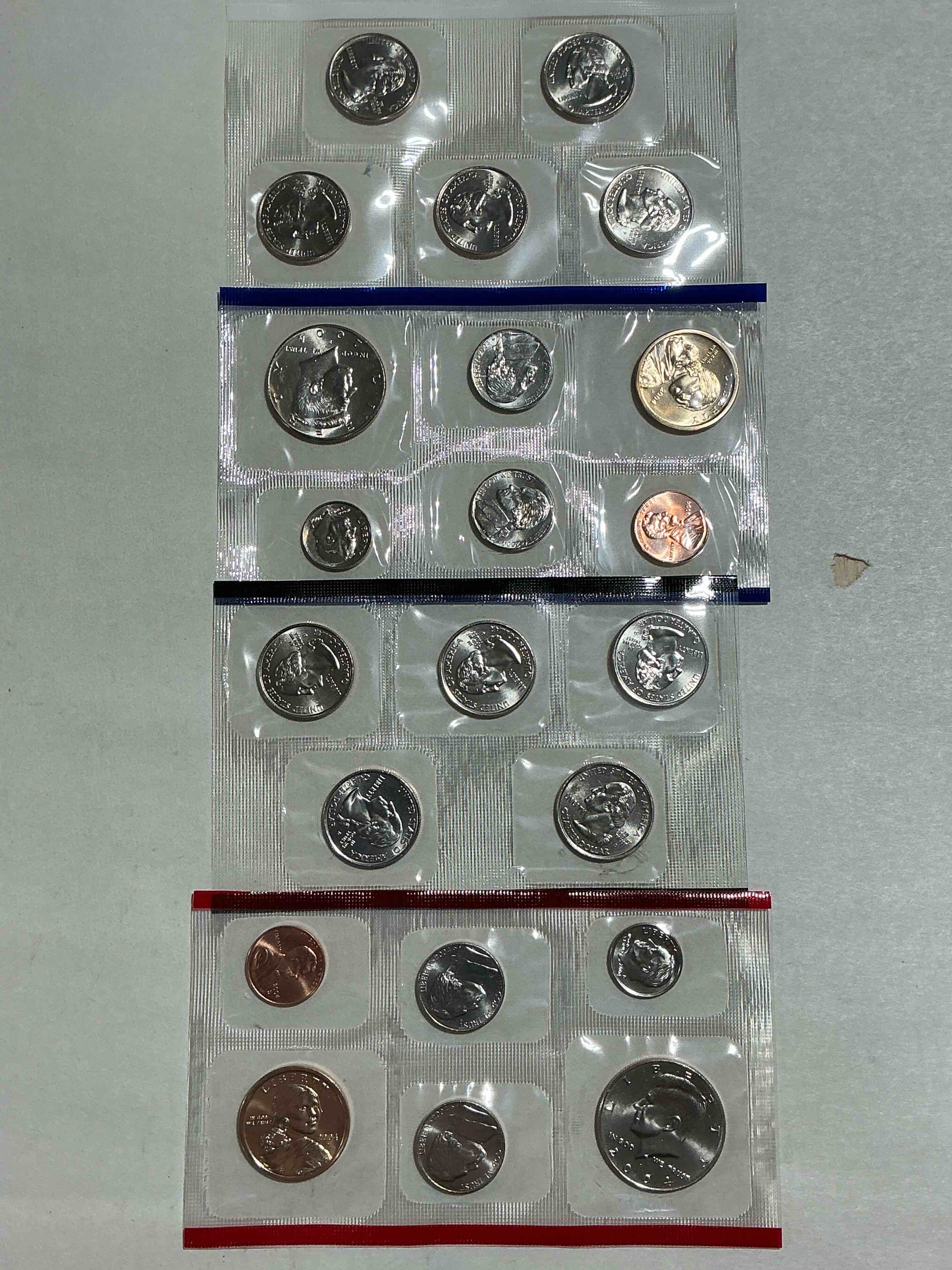2004 Uncirculated Mint Coins! 22 Coin Mint Coins With State Quarters! Half Dollars, One Dollar Coins, Quarters, Nickels, Dimes & Pennies! 22 Coin Uncirculated Mint Coins! 