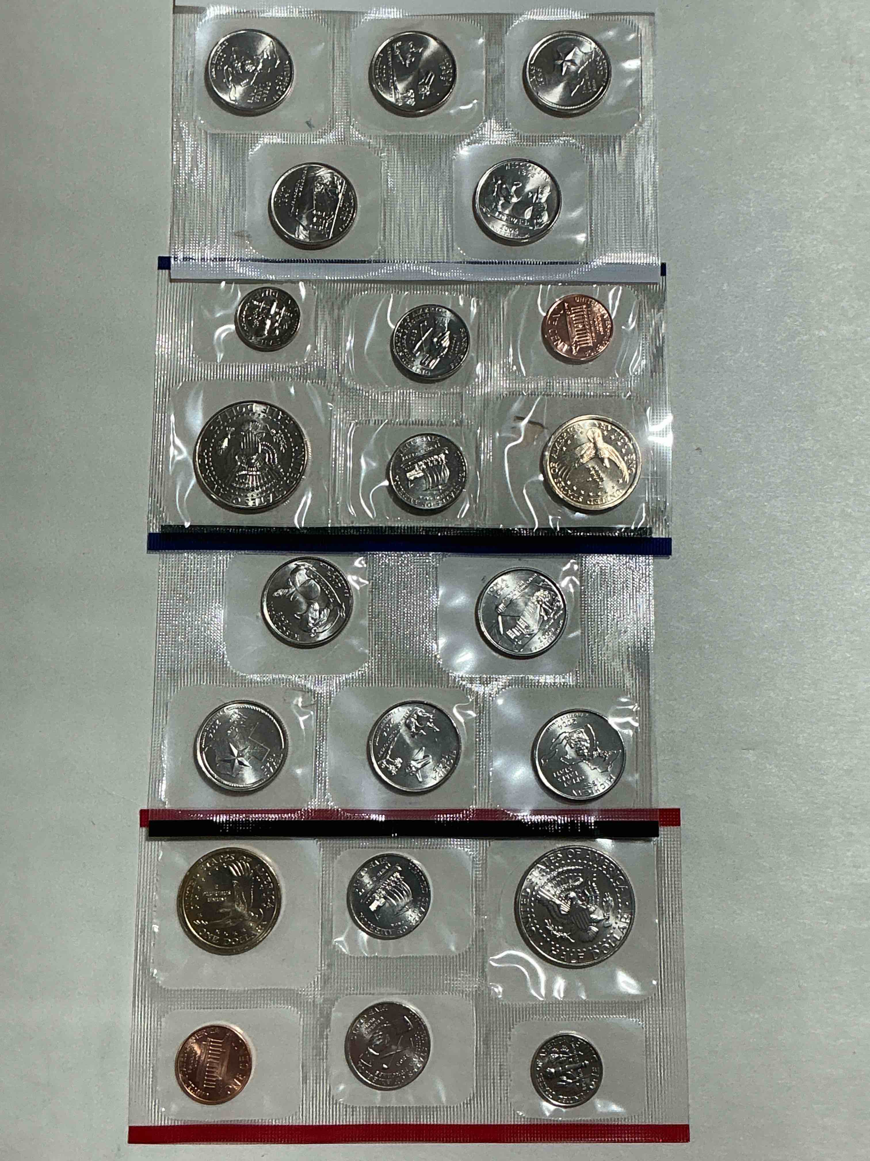 Condition photo showing New/Like New for 2004 Uncirculated Mint Coins! 22 Coin Mint Coins With State Quarters! Half Dollars, One Dollar Coins, Quarters, Nickels, Dimes & Pennies! 22 Coin Uncirculated Mint Coins! 
