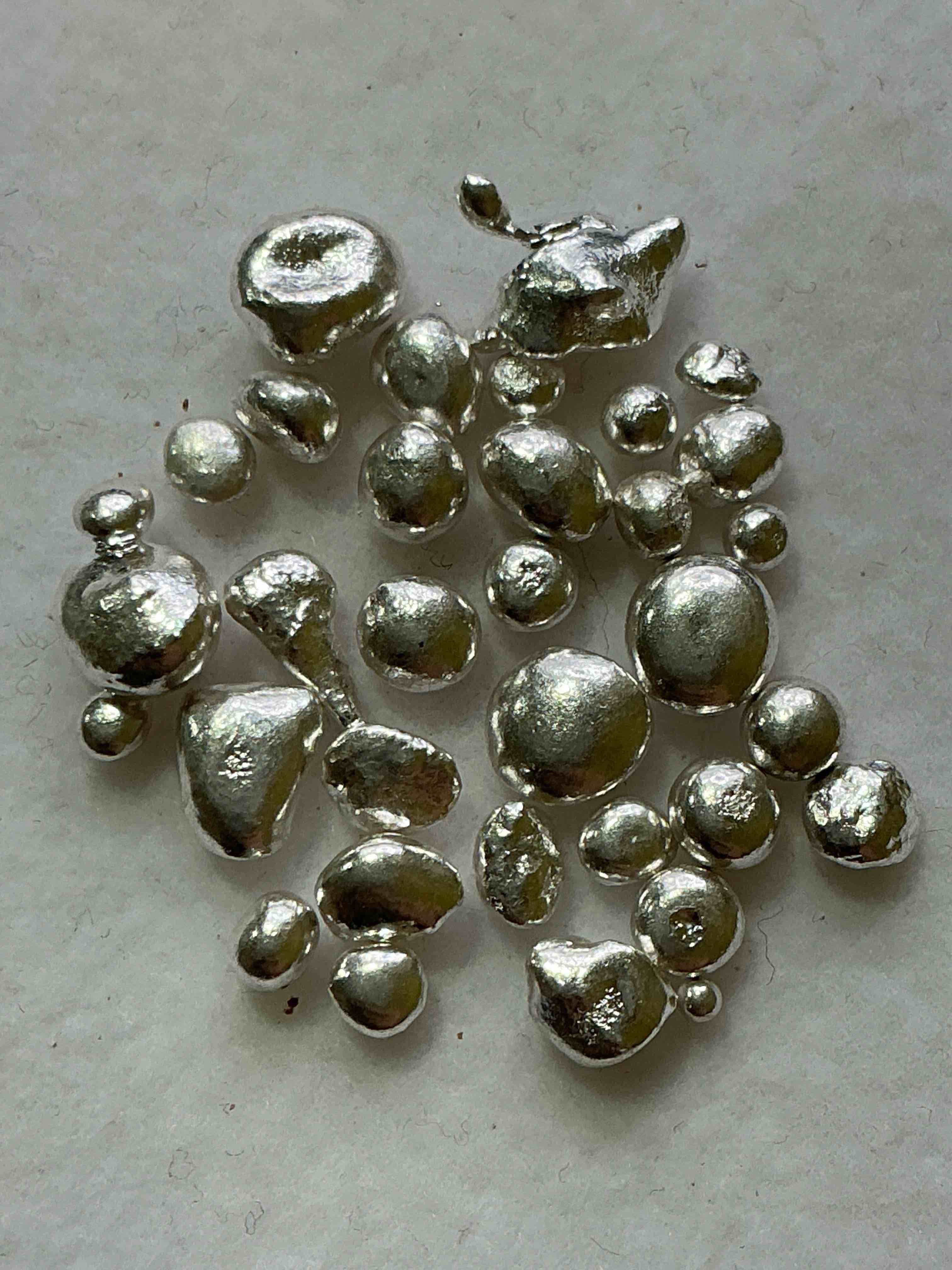 Silver Nuggets! .999 US Fine Silver, In Small Nugget Form! Total Weight Of All Nuggets In Lot Approximately 9 Grams, Bid Is Per Nugget! A Cool Way To Invest In Fine US Silver! Includes Collector Capsule!