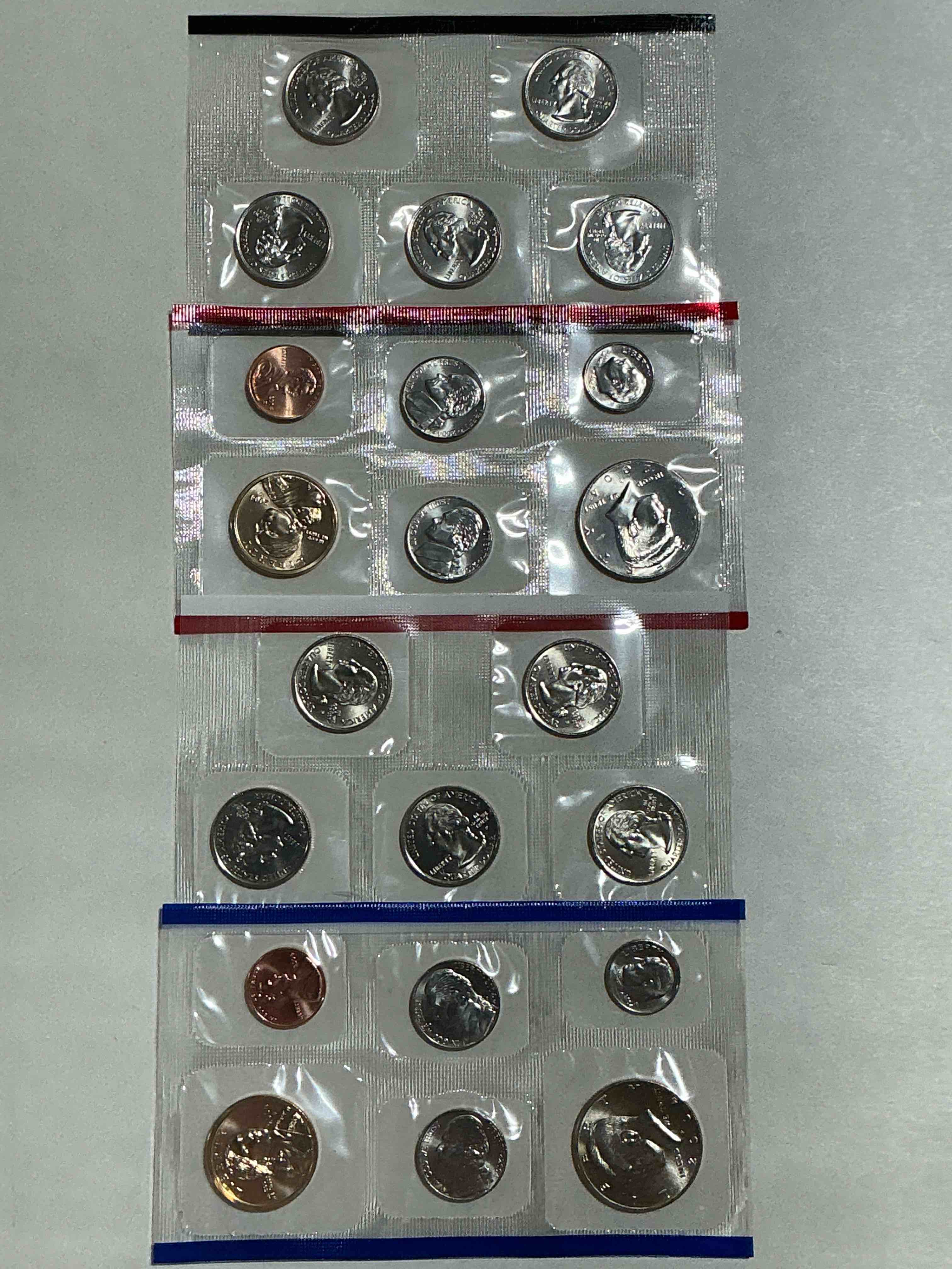 2004 uncirculated mint coins! 22 coin mint coins with state quarters! half dollars, one dollar coins, quarters, nickels, dimes & pennies! 22 coin uncirculated mint coins! 