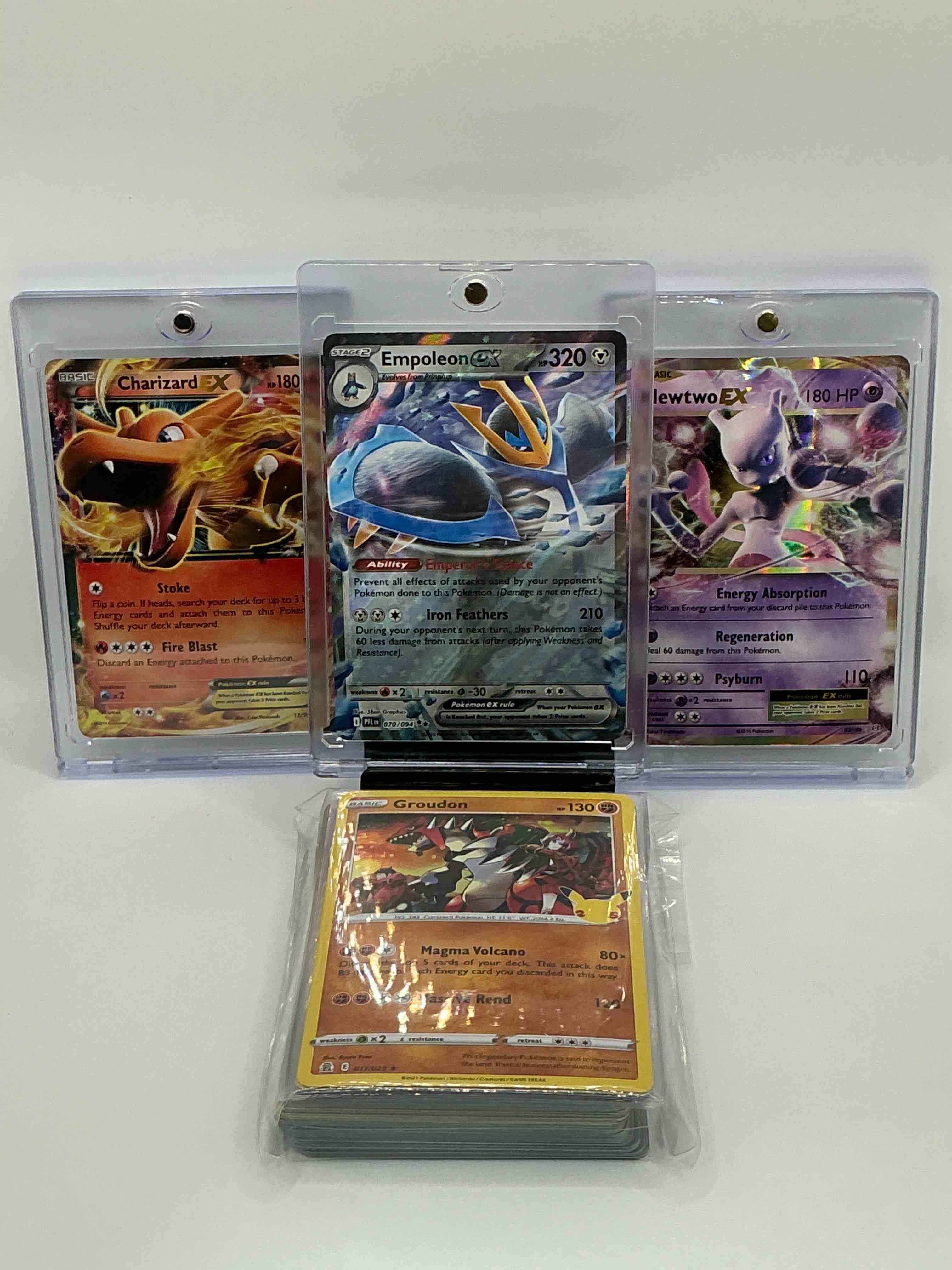 Pokémon Palooza! Silver Shimmer Emperor’s Stance Iron Feathers  Empoleon EX, Purple & Gold Swirl Energy Absorption Regeneration Psyburn Mewtwo EX, Silver & Orange Flare Stoke Fire Blast Charizard EX! Along With 50 Other Pokémon Heroes, Holos, Legends & Commons!