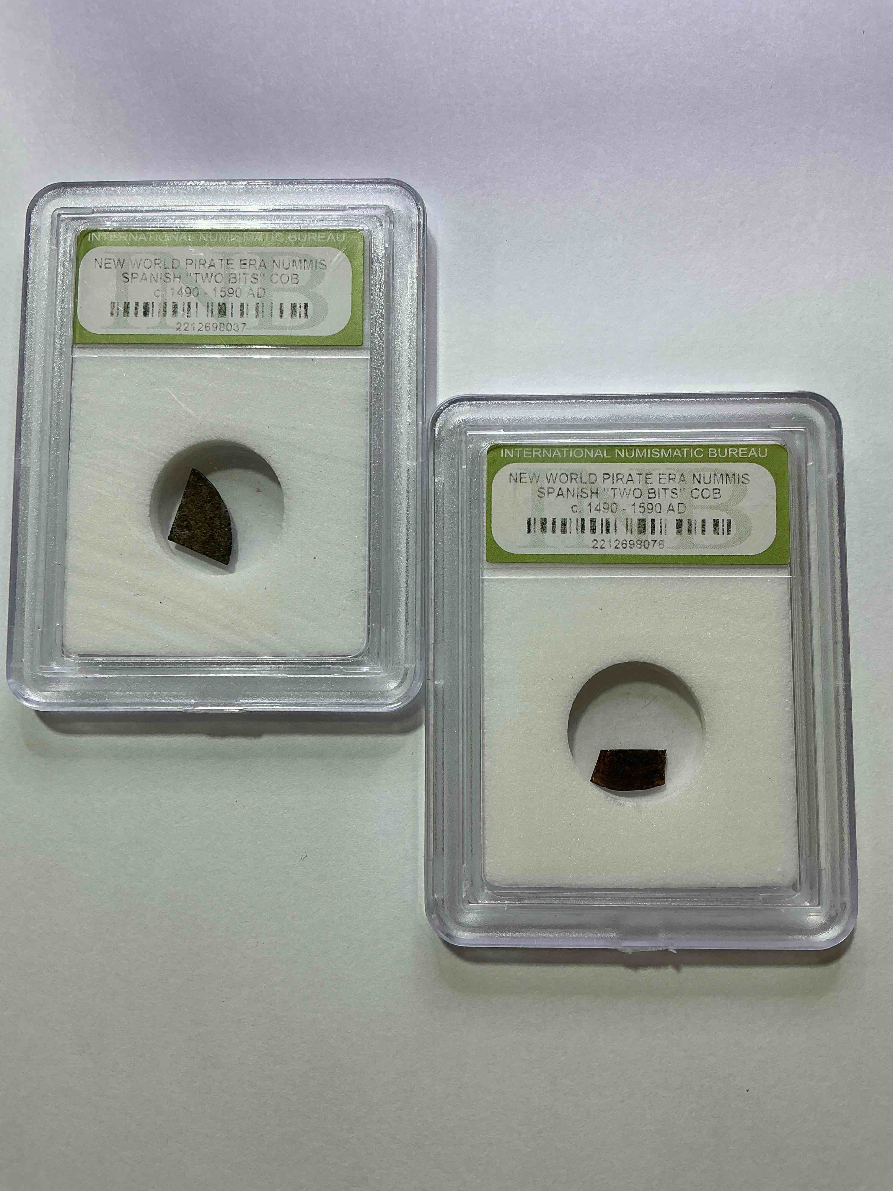 pirate era spanish "two bits" coin, authentic! circa 1490-1590, 400 to 500 years old! these copper "two bit" pieces were hand cut off larger coins in the golden pirate age to create smaller denominations. a genuine piece of cool history! a great authentic pirate era collectible encased in inb slab!