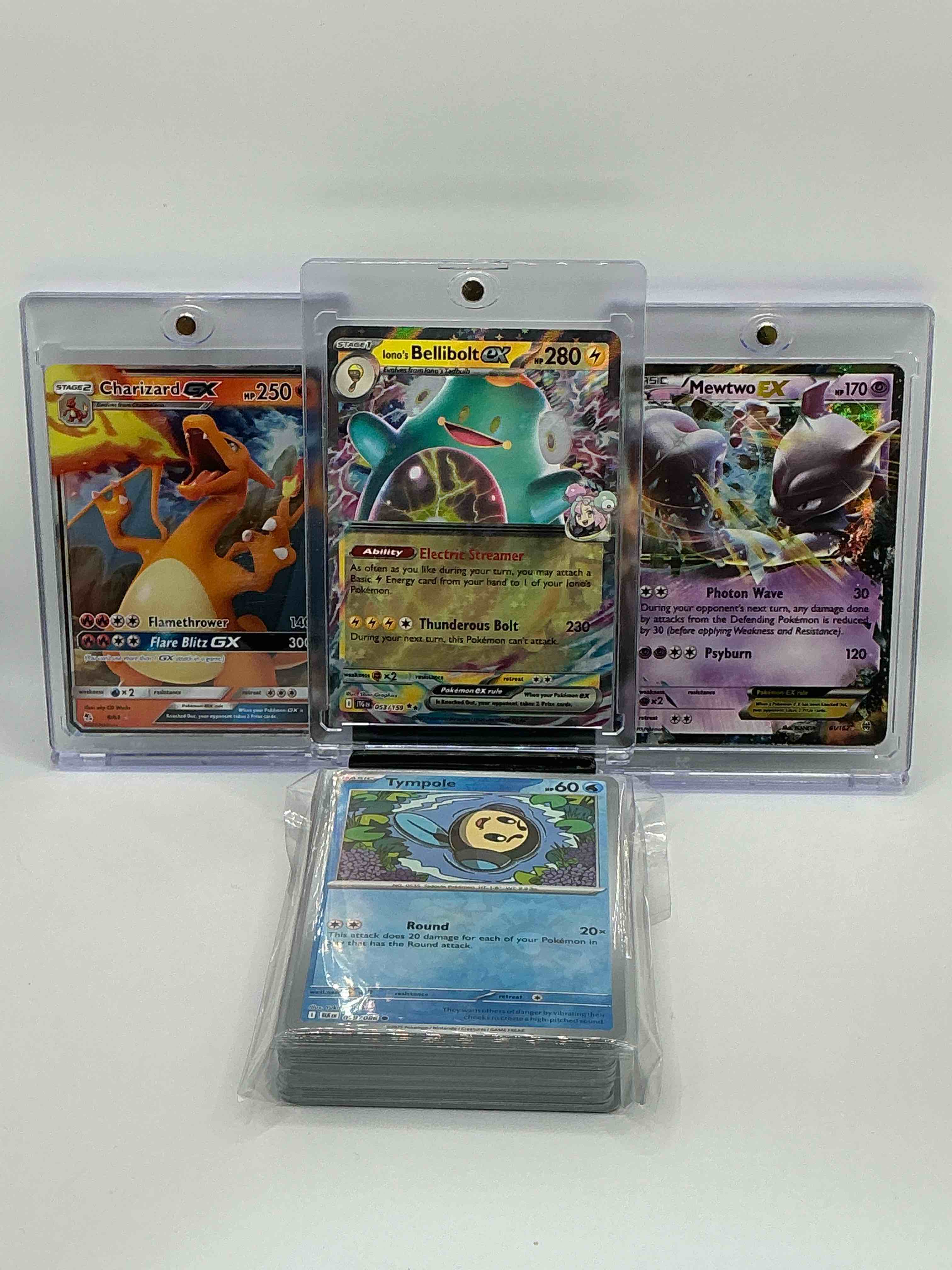 Pokémon Palooza! Silver Shimmer Electric Streamer Thunderous Bolt Iono’s Bellibolt EX! Silver & Orange Flamethrower Flare Blitz GX Charizard GX! Purple & Gold Photon Wave Psyburn Mewtwo EX! Along With 50 Other Pokémon Heroes, Holos, Legends & Commons!