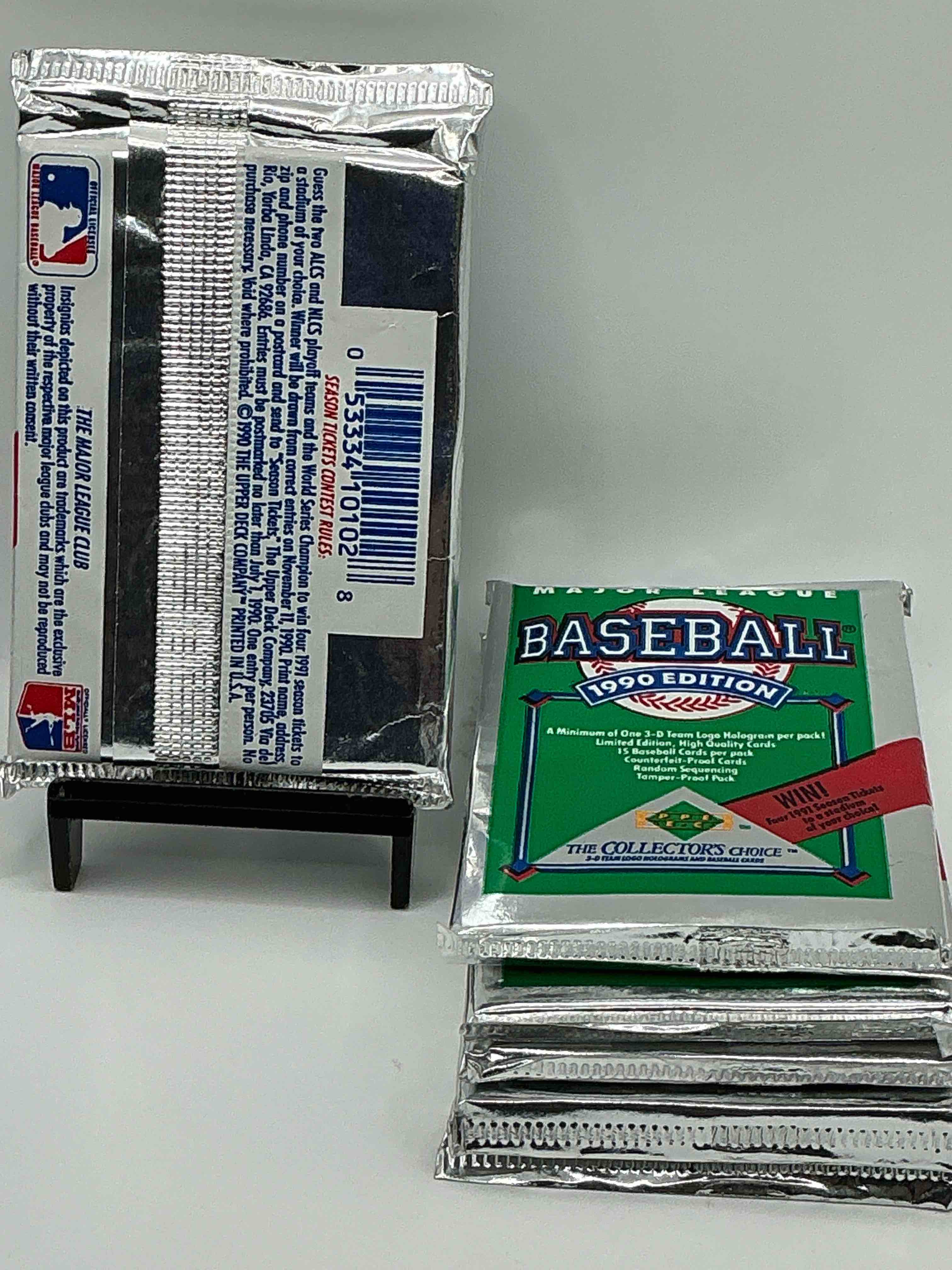 Condition photo showing New/Like New for 1990 Upper Deck Baseball Unopened Sports Trading Card Packs! Direct From Original Box! Look For Possible Collector's 3D Team Logo Card! As Well As Early Ken Griffey Jr. Cards!