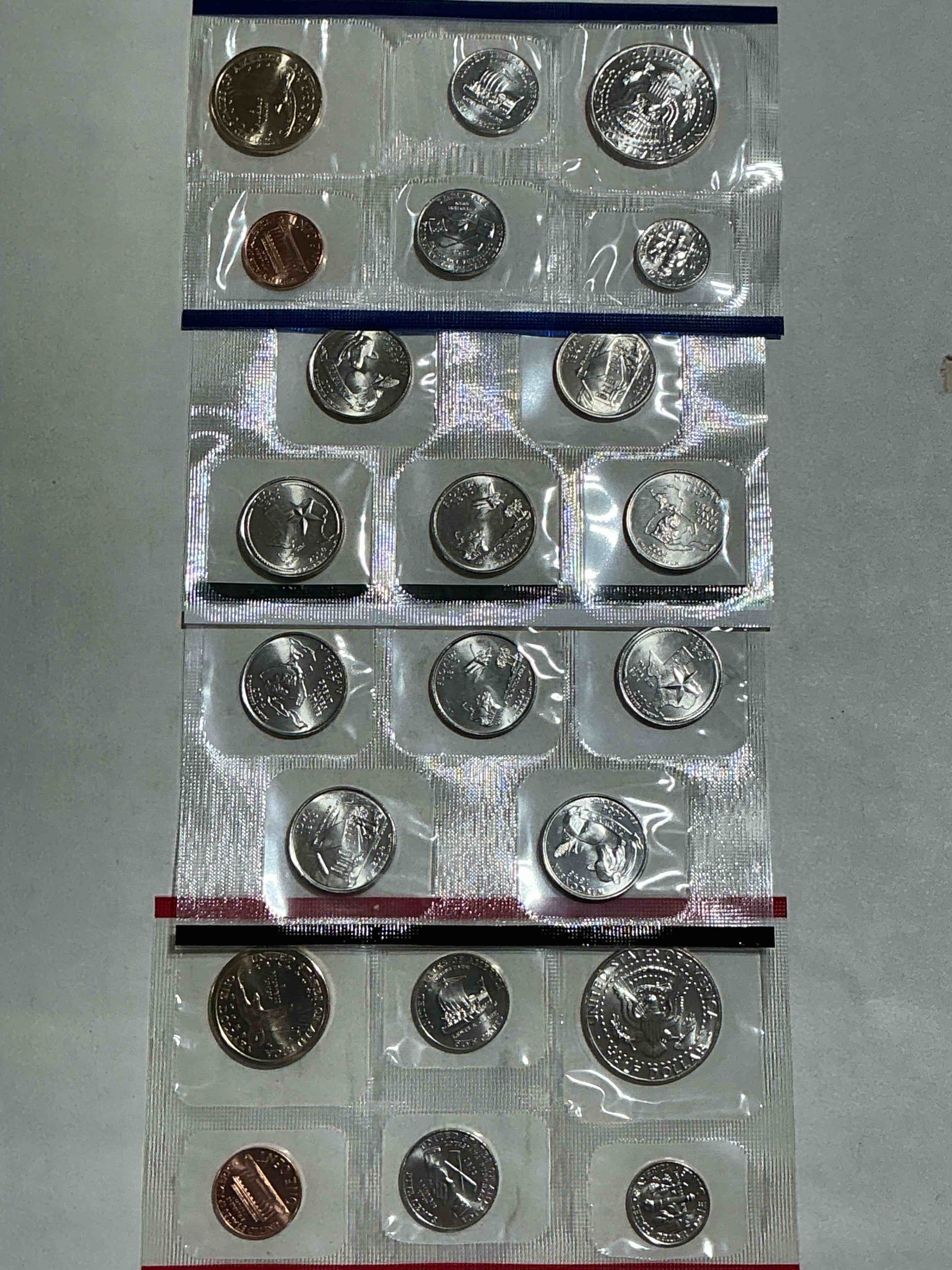 Condition photo showing New/Like New for 2004 Uncirculated Mint Coins! 22 Coin Mint Coins With State Quarters! Half Dollars, One Dollar Coins, Quarters, Nickels, Dimes & Pennies! 22 Coin Uncirculated Mint Coins! 