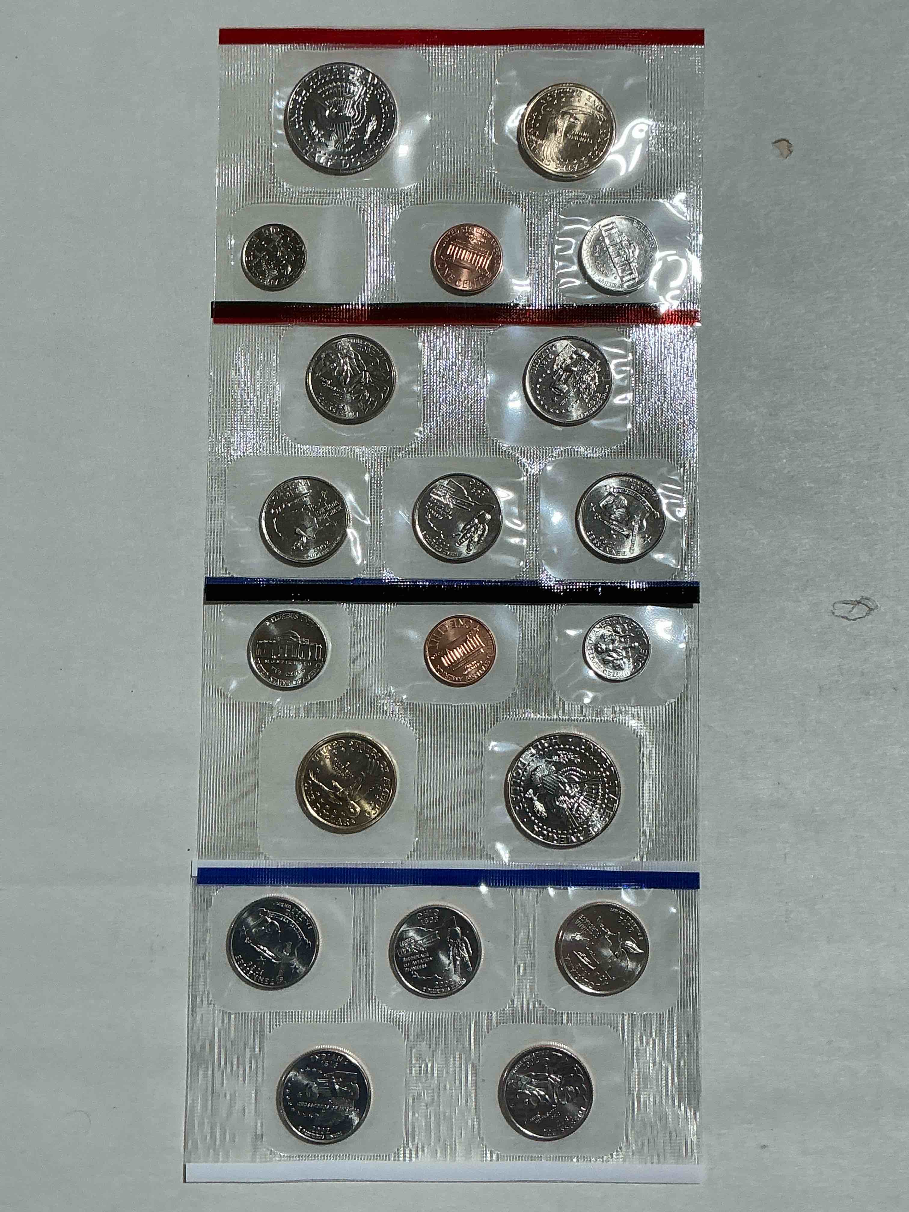 Condition photo showing New/Like New for 2002 Uncirculated Mint Coins! 20 Coins From Philadelphia & Denver! 20 Coin Uncirculated Lot, With State Quarters, Nickels, Half Dollars, Dimes, Pennies & More! Uncirculated Coin Craziness!
