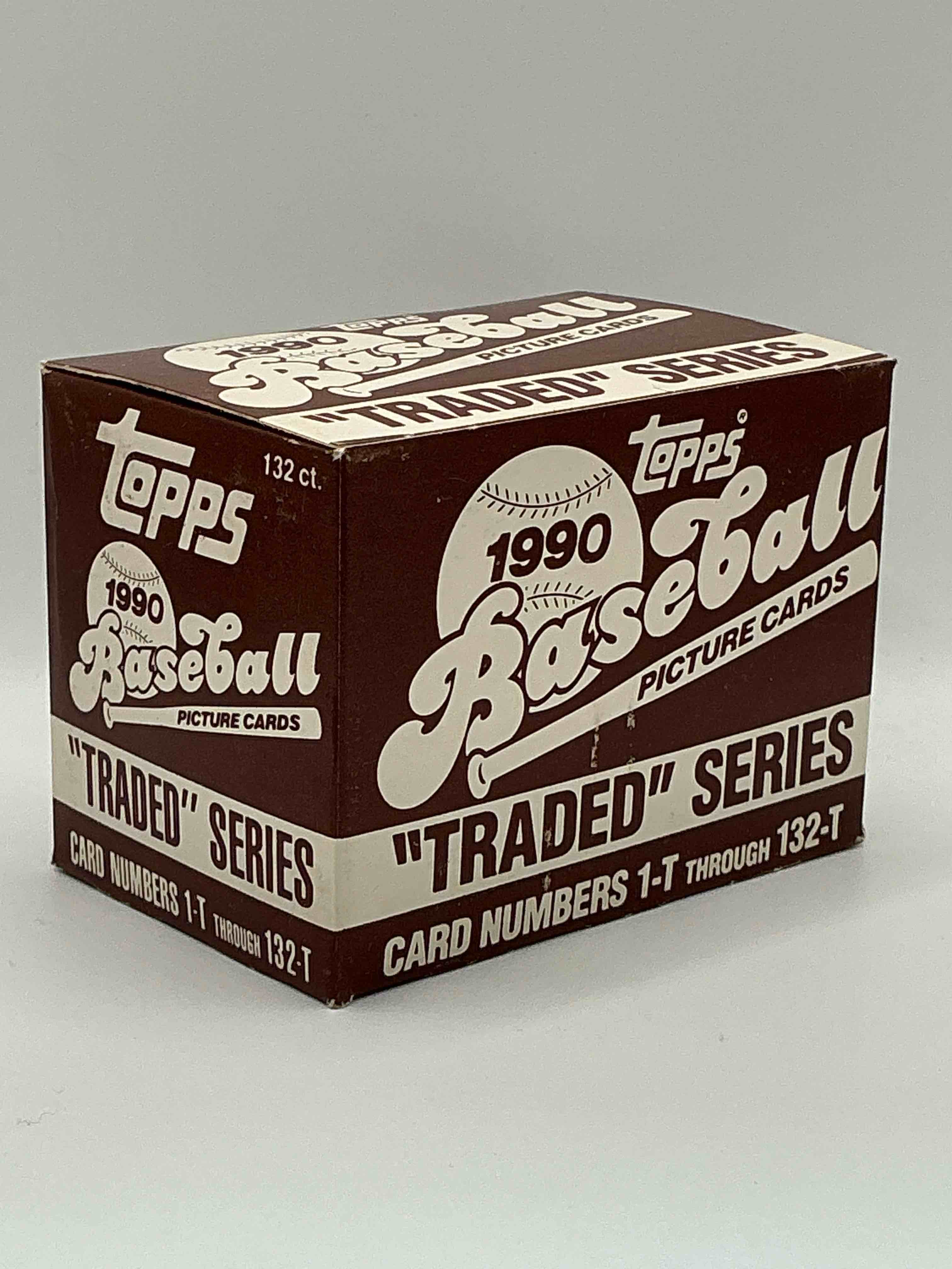 Condition photo showing New/Like New for 1990 Topps Baseball Card Complete Unopened Traded Series, Card Numbers 1-T Through 132-T. Set Is Unopened (These Sets Were Never Factory Sealed In Plastic From Manufacturer). Set Includes David Justice Traded Rookie. Great Sports Card Memorabilia!