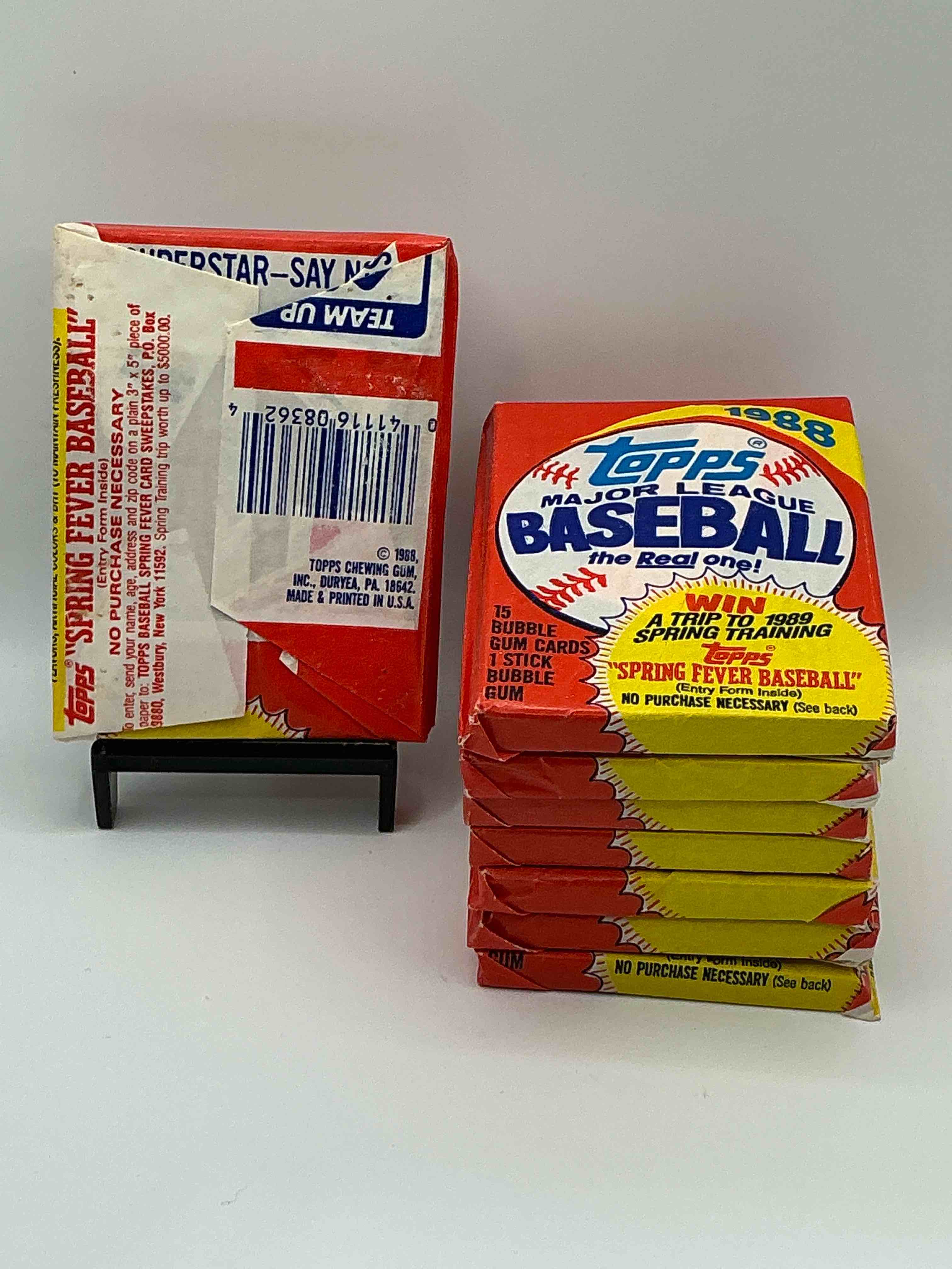 Condition photo showing New/Like New for 80's Baseball Fan's Rejoice! 1988 Topps Baseball Unopened Wax Packs Full Of Collectible Trading Cards! Search For Valuable Don Mattingly "World Of Baseball" & Nolan Ryan Cards Worth Hundreds In Perfect Condition!