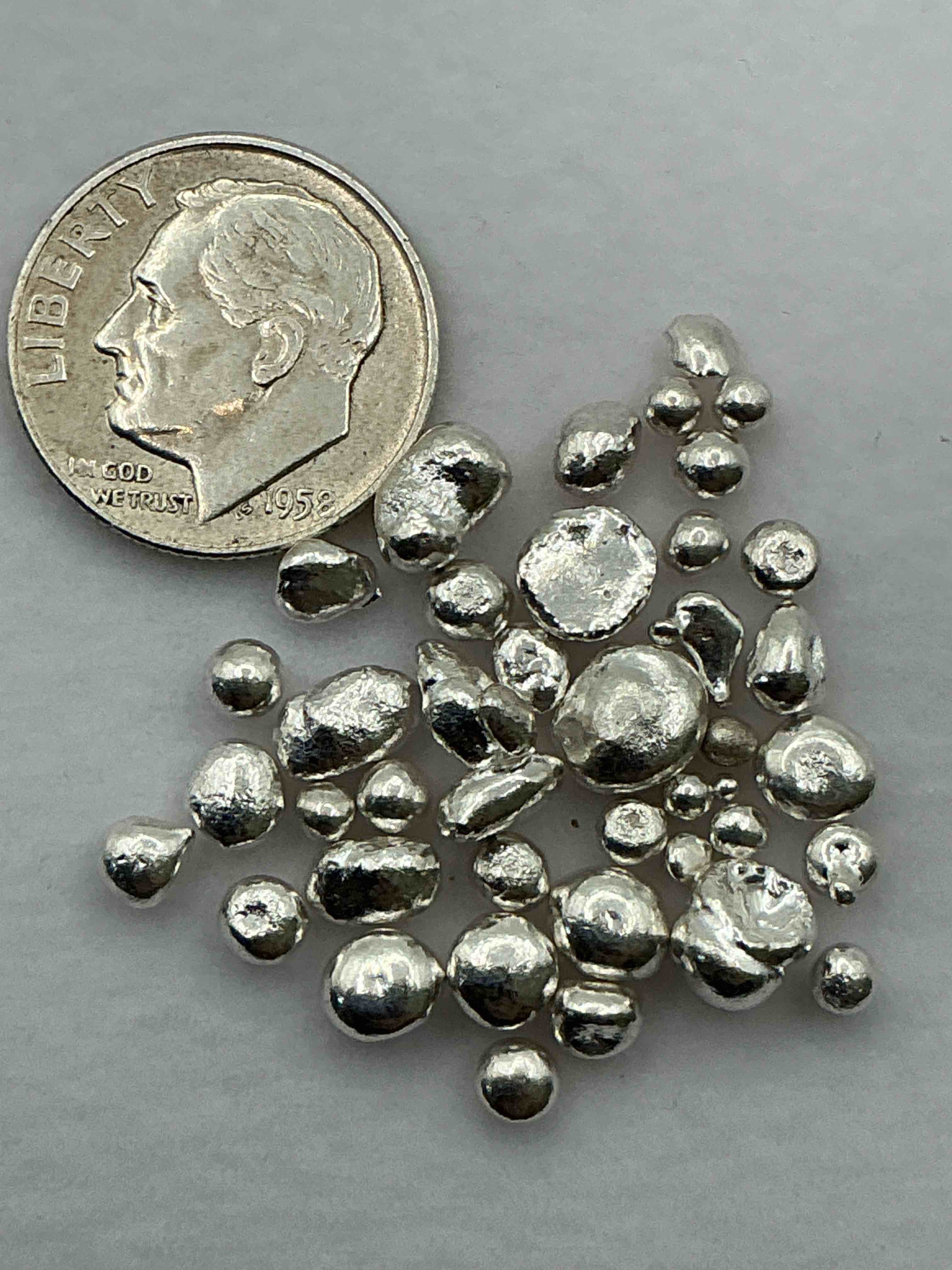 Condition photo showing New/Like New for Silver Nuggets! .999 US Fine Silver, In Small Nugget Form! Total Weight Of All Nuggets In Lot Approximately 9 Grams, Bid Is Per Nugget! A Cool Way To Invest In Fine US Silver! Includes Collector Capsule!