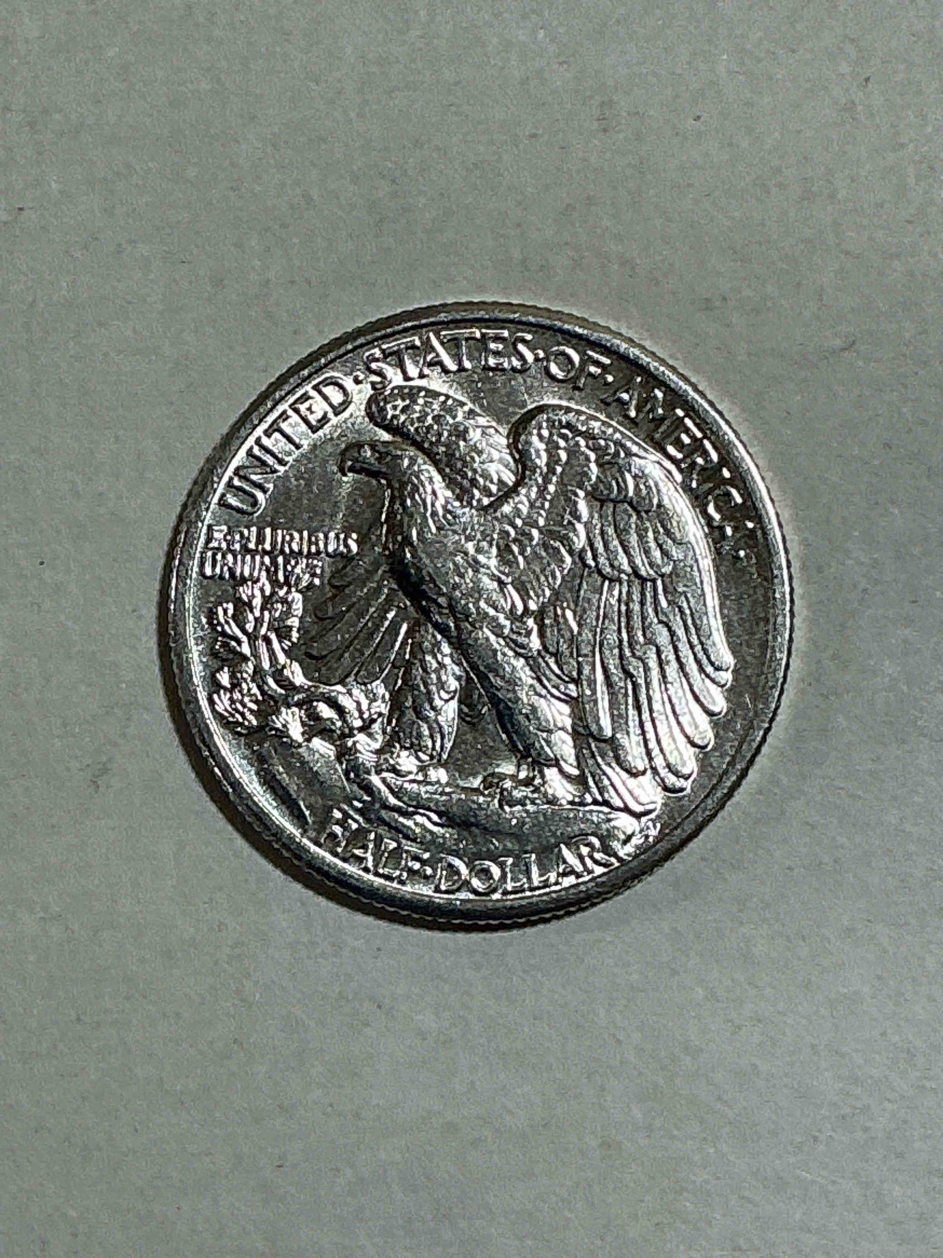 Condition photo showing New/Like New for World War II Era Silver! Antique U.S. Silver! Liberty Walking Silver Fine U.S. Silver Half Dollar! This Striking Half Dollars Were Minted From 1916-1947 & Have Become Some Of The Most Collectible Coins In History! Here Is A Striking Uncirculated Example From 1941! Liberty Walking Coins Are 90% Fine U.S. Silver, A Great Investment In Precious Metal!