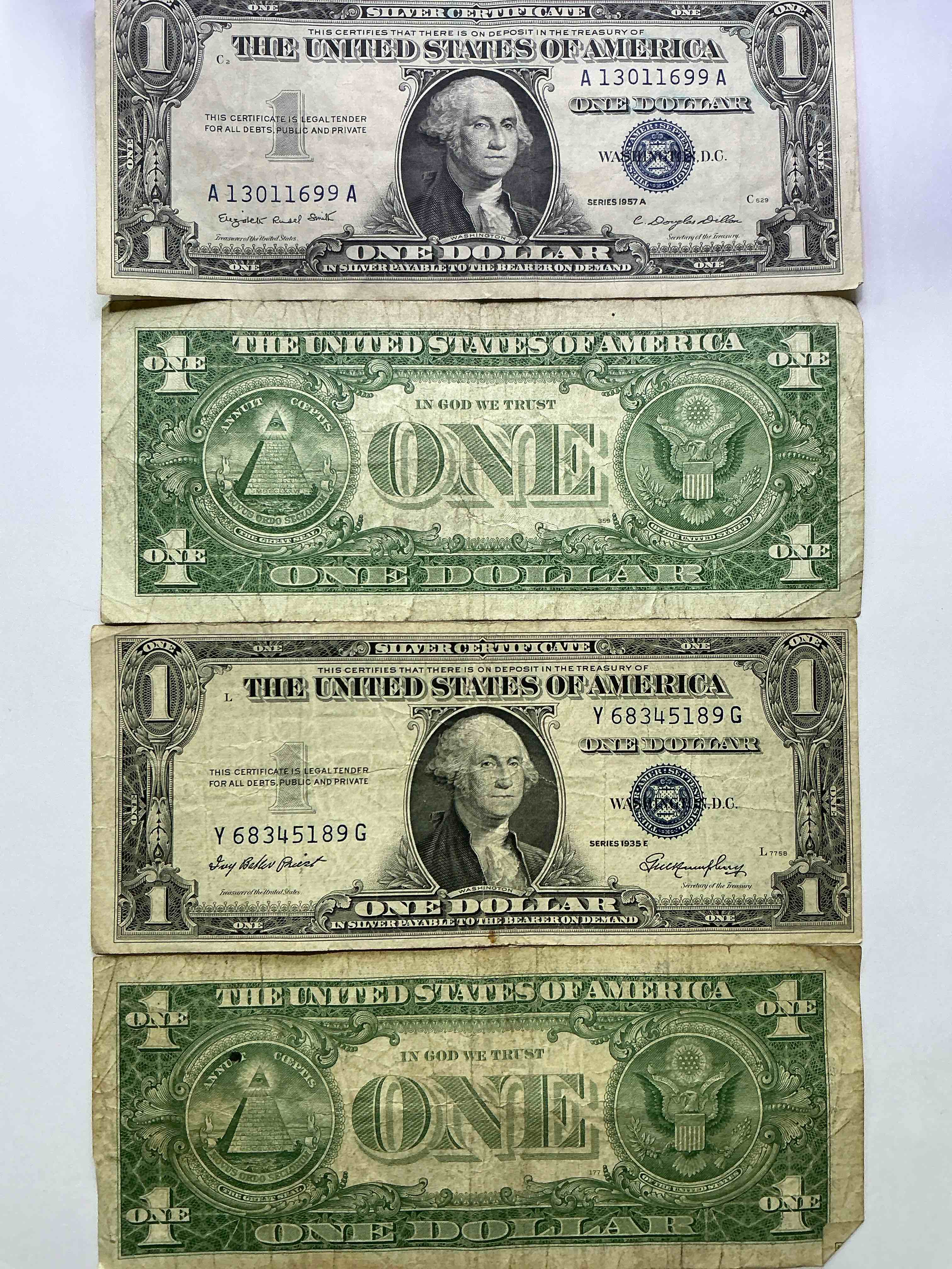 1957 & 1935 Silver Certificates! Did You Know That Prior To 1964 One Dollar U.S. Paper Money Was Actually Redeemable For Silver Dollars?! Wow How Times Have Changed! Silver Certificates Were Produced From 1878 To 1964 & Are Still Considered Legal Tender At Face Value. Here Are Gorgeous, Circulated 1935 & 1957 U.S. One Dollar Silver Certificate, With Highly Collectible "Blue Seal!* Own An Awesome Piece Of History!