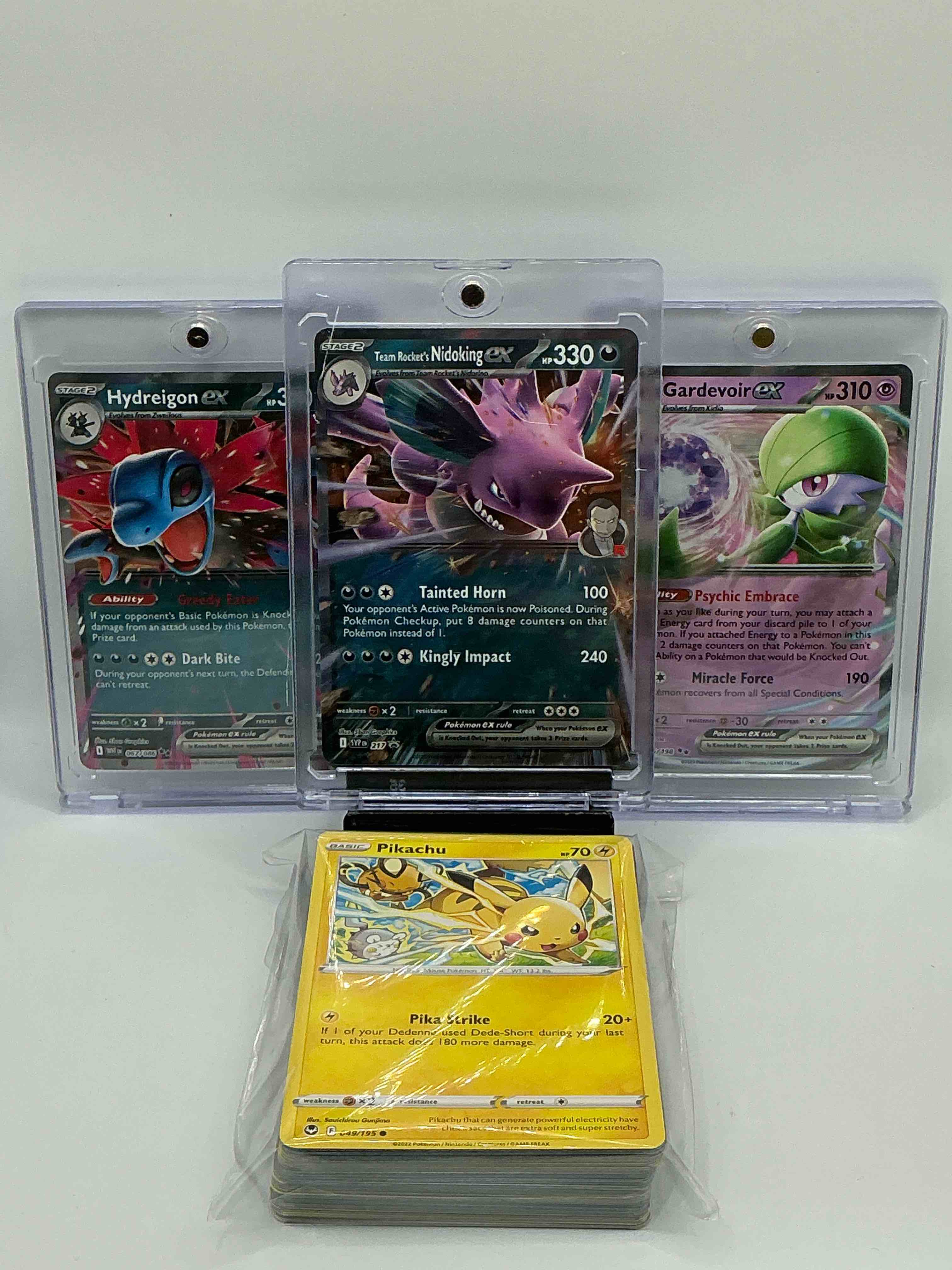 pokémon palooza! silver & blue shimmer tainted horn kingly impact team rocket’s nidoking ex! silver & red shimmer greedy eater dark bite hydreigon ex! silver & purple shimmer psychic embrace miracle force gardevior ex! along with 50 other pokémon heroes, legends & commons!