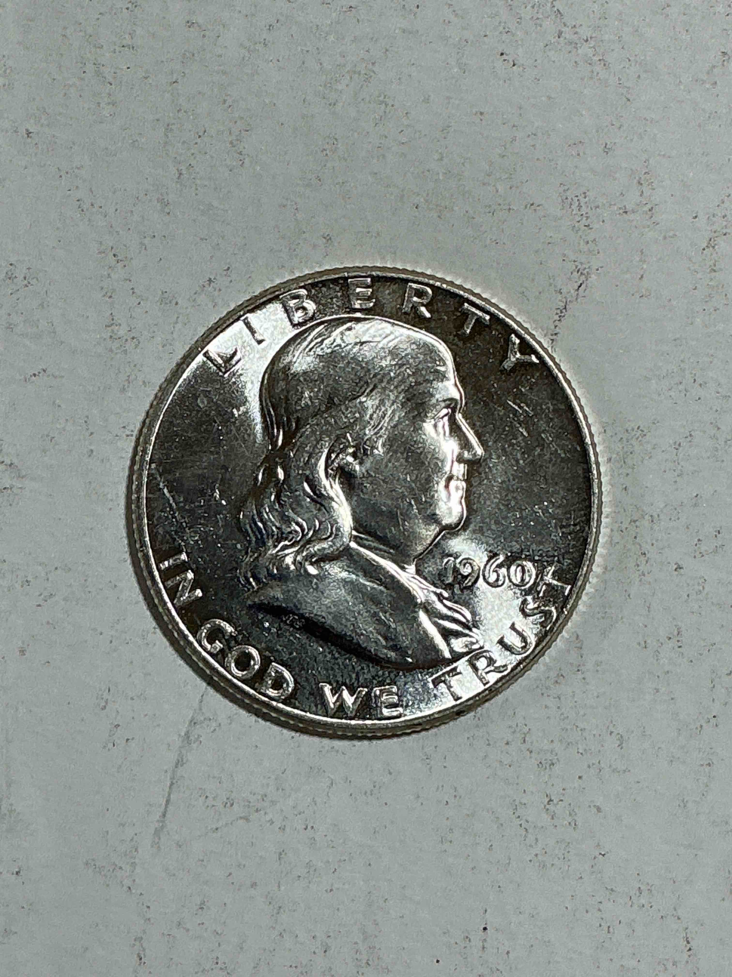 Uncirculated Ben Franklin Silver! Pre 1965 Silver U.S. Half Dollar Coins! Before 1965 American Half Dollars Were Actually Silver, Here Is A Rare Version in Excellent, Uncirculated Condition! Great For Investing In Precious Metals! These Heavy Half Dollars Were Minted At 90% Silver and 10% Copper, Giving Them A Net Weight Of 36169 Ounces Of Pure Silver Per Coin! Very Rare In This Great. Condition!